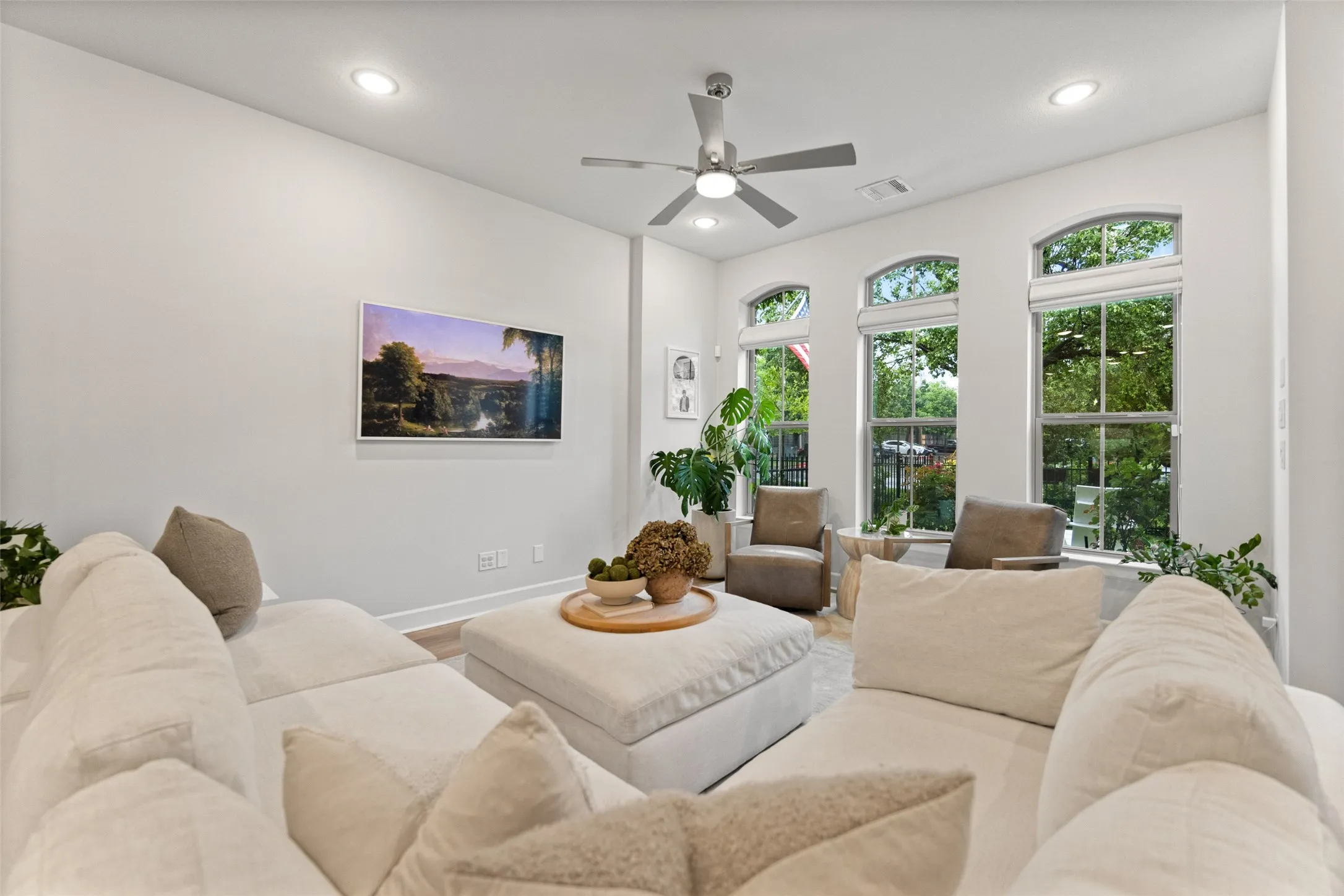 The high ceilings and Level 4 wall finishes give the main living area a refined feel while staying warm and approachable