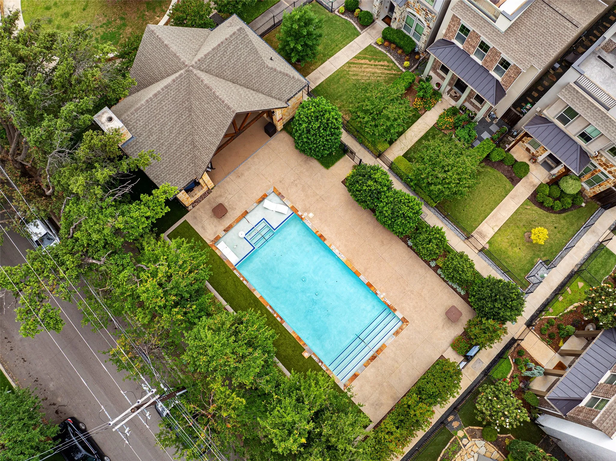 The poolside area offers plenty of space to lounge and soak in the relaxed atmosphere of the Oak Park community