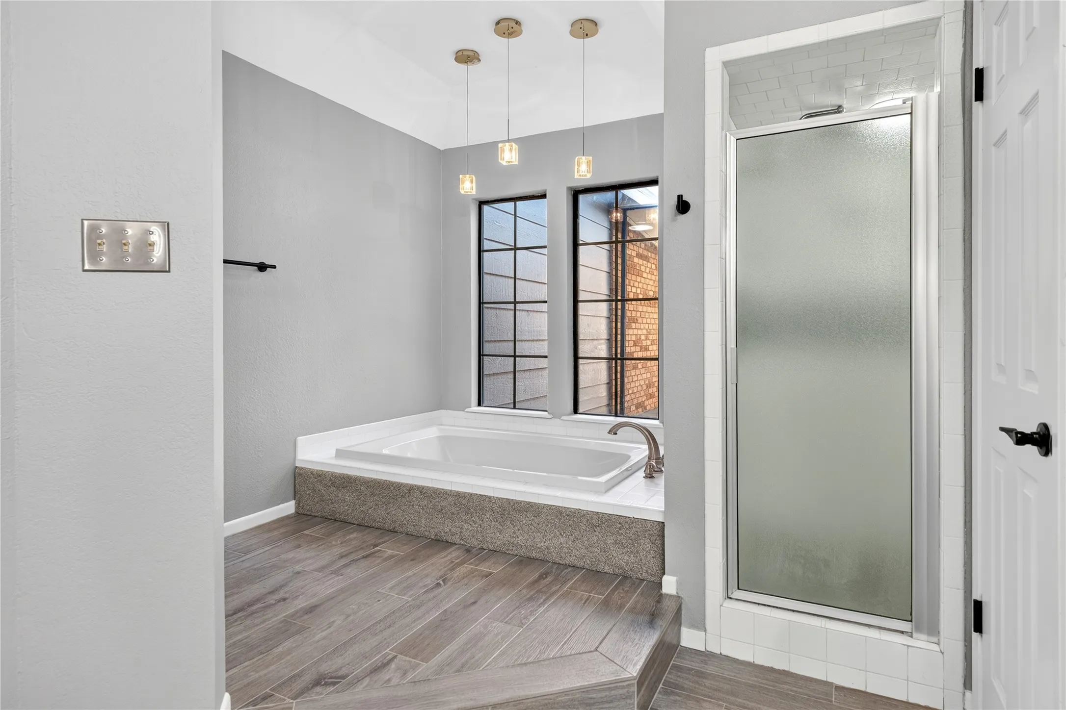 Separate shower and relaxing tub to unwind from a long day.