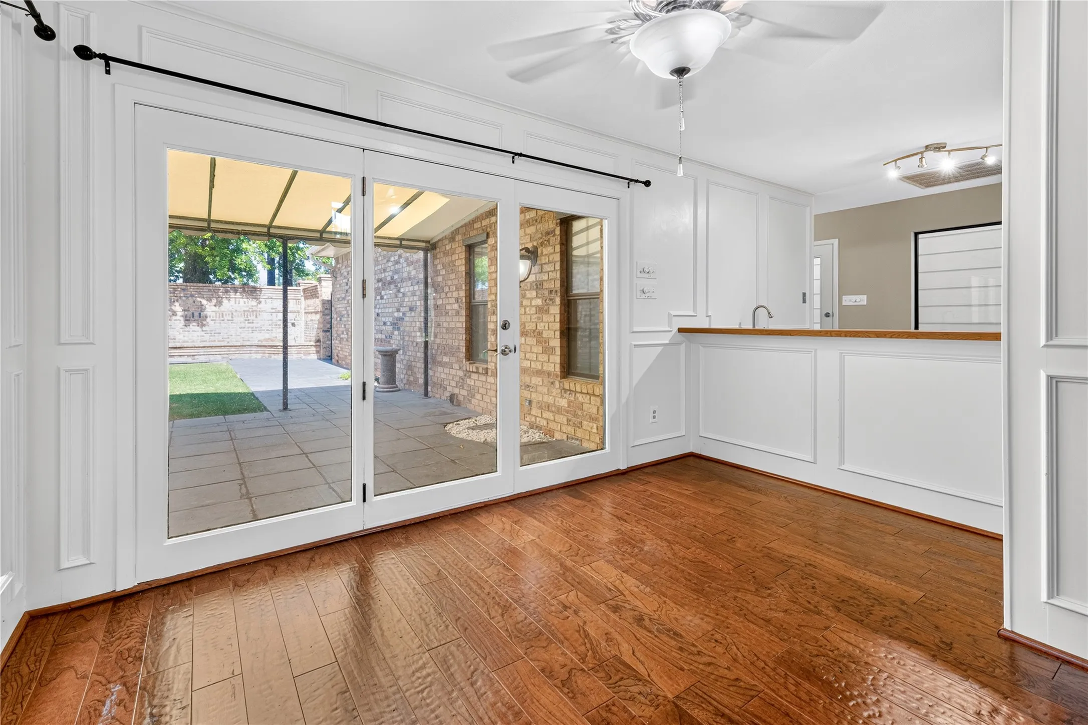 Great place for some bar stools and another view of the canopy covered back patio.
