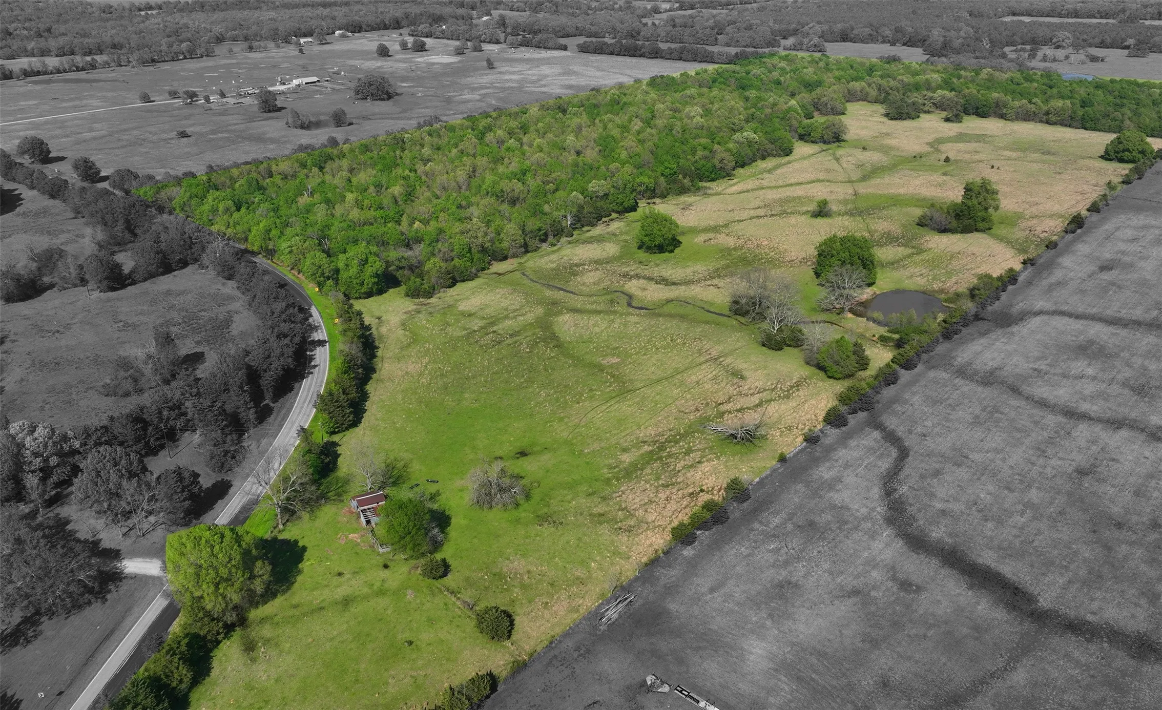 cleared and wooded land