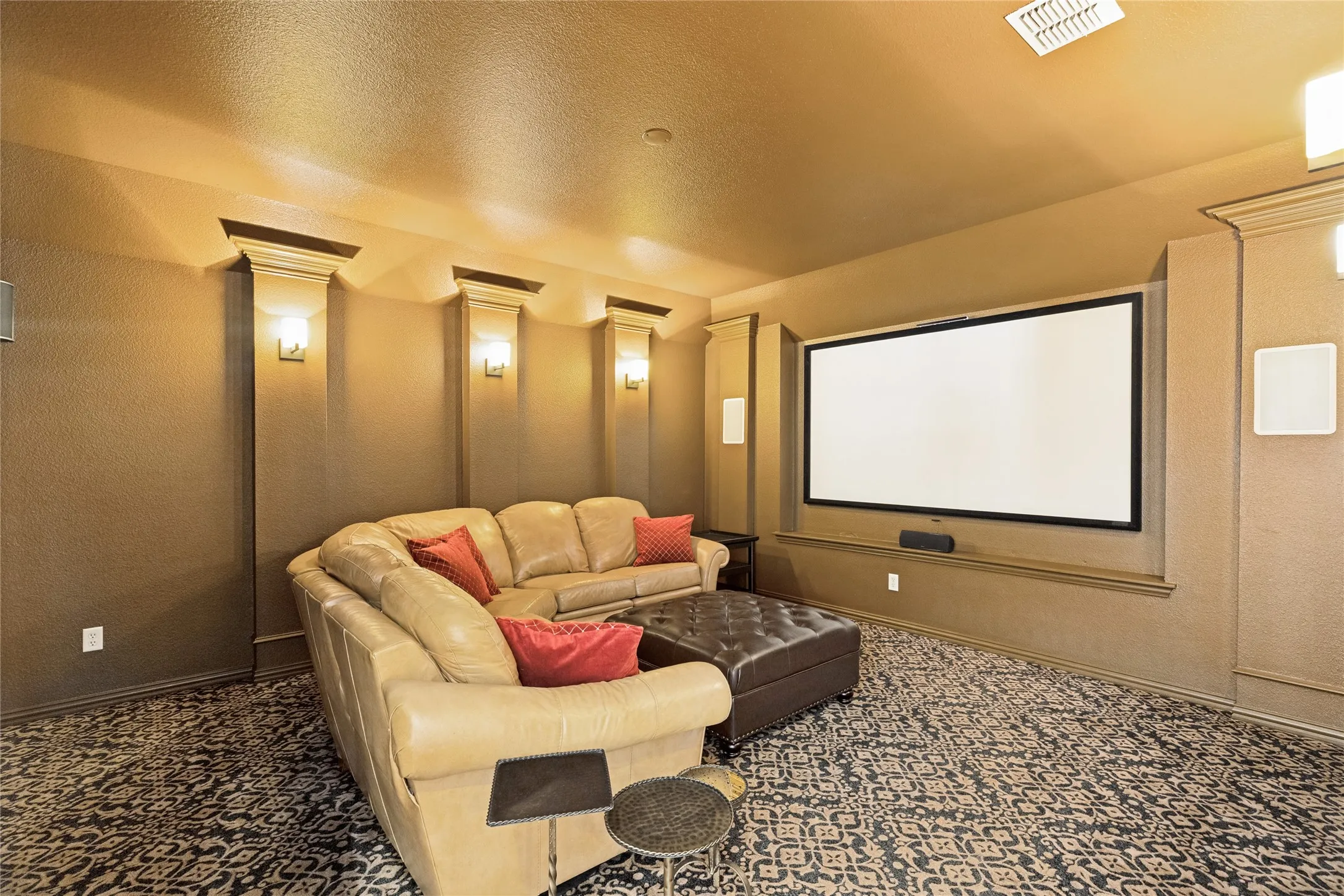 Fantastic Media Room upstairs with sconce lighting,equipment remains with home