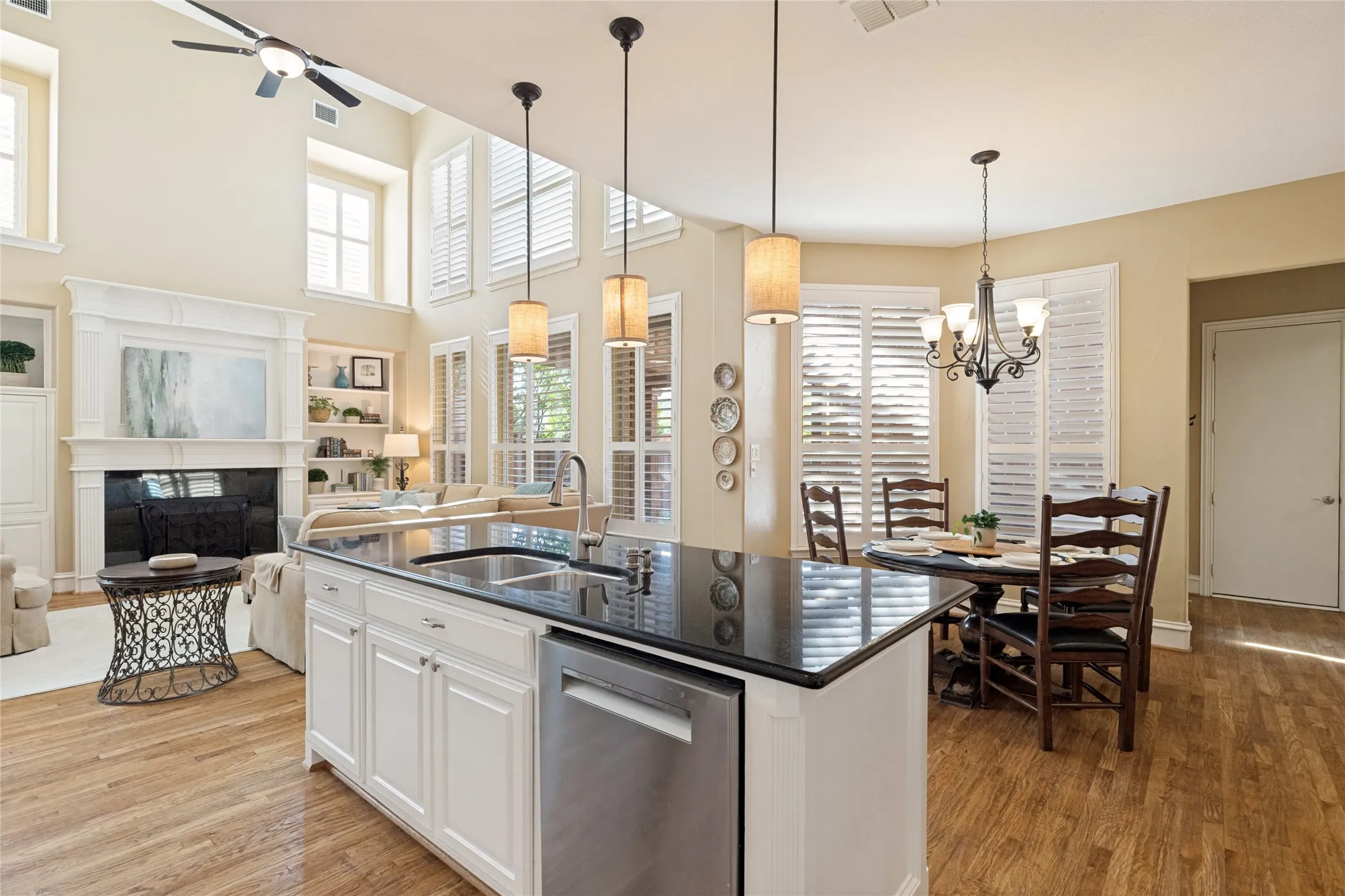 Kitchen w view of living area and breakfast room