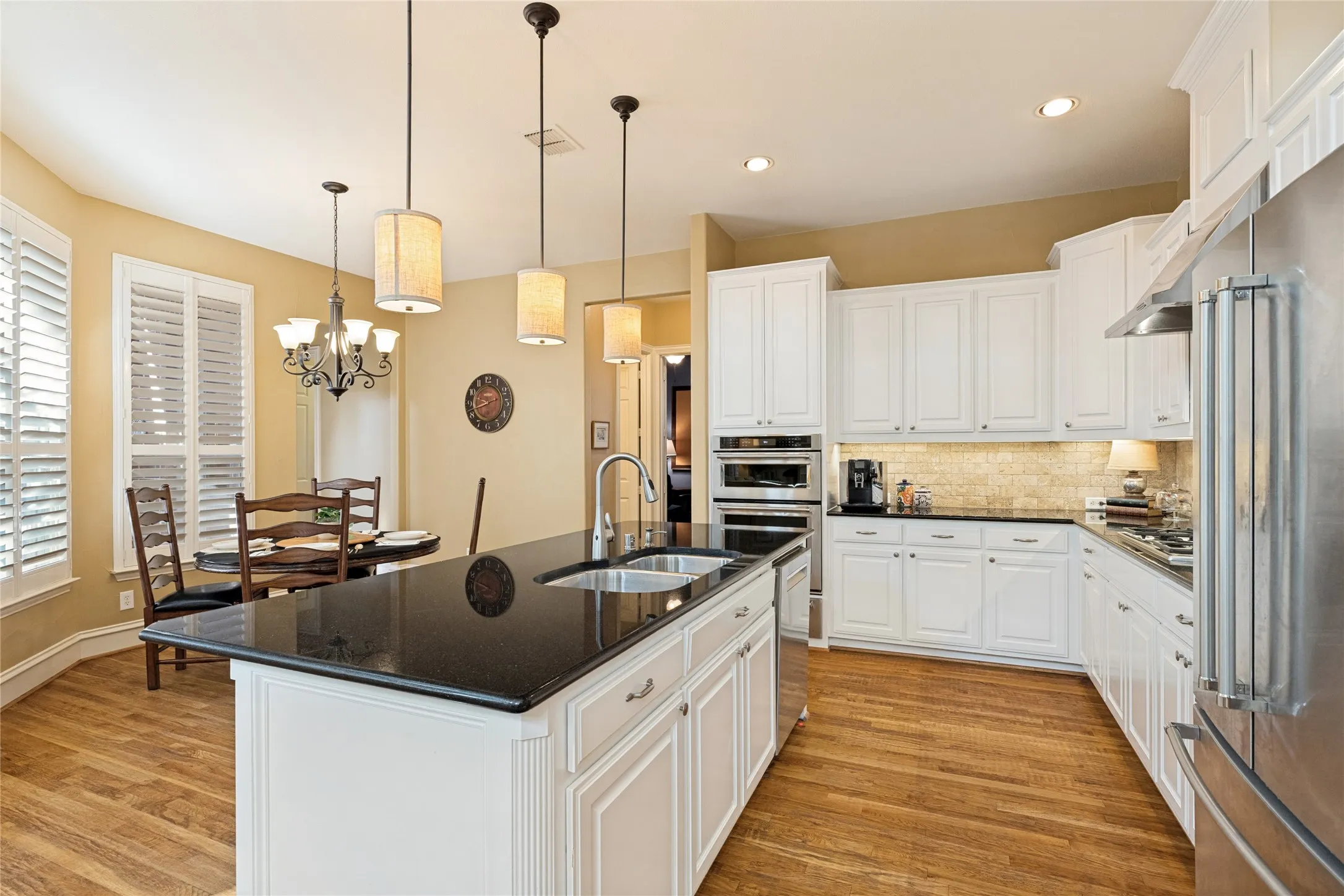 Island with view of breakfast room - Loads of Cabinets, SS Appliances, Gas Cooktop!