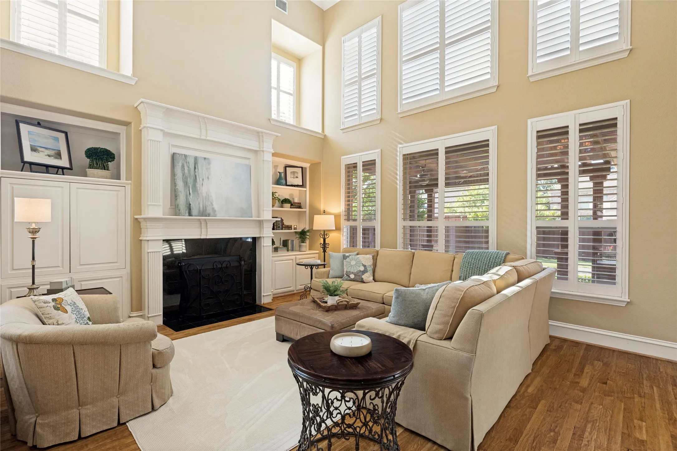 Living area showcasing wall of windows for beautiful light