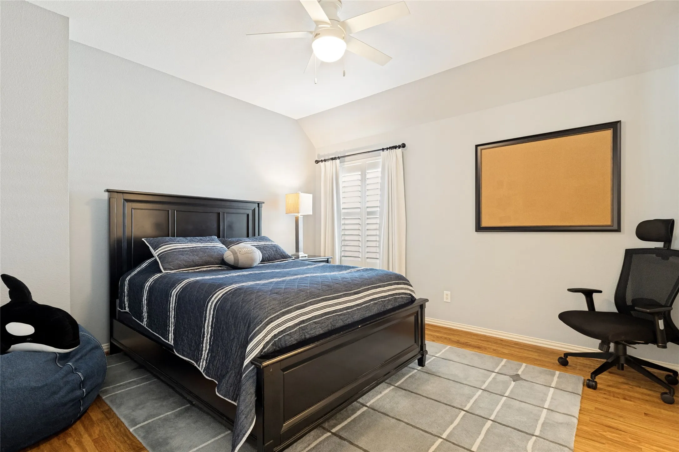 Bedroom #5 located on second level -Plantation Shutters, Hardwood floors, Ceiling Fan, WIC