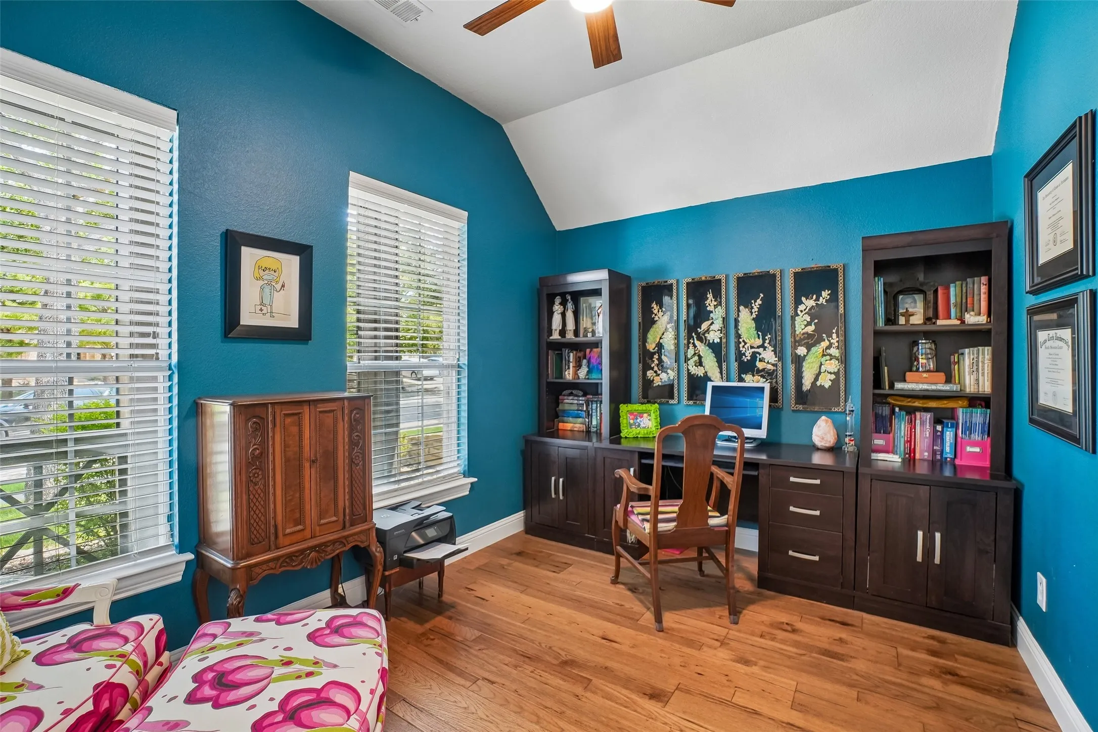 Office with windows looking out to the front  yard.  Engineered hickory wood floors.