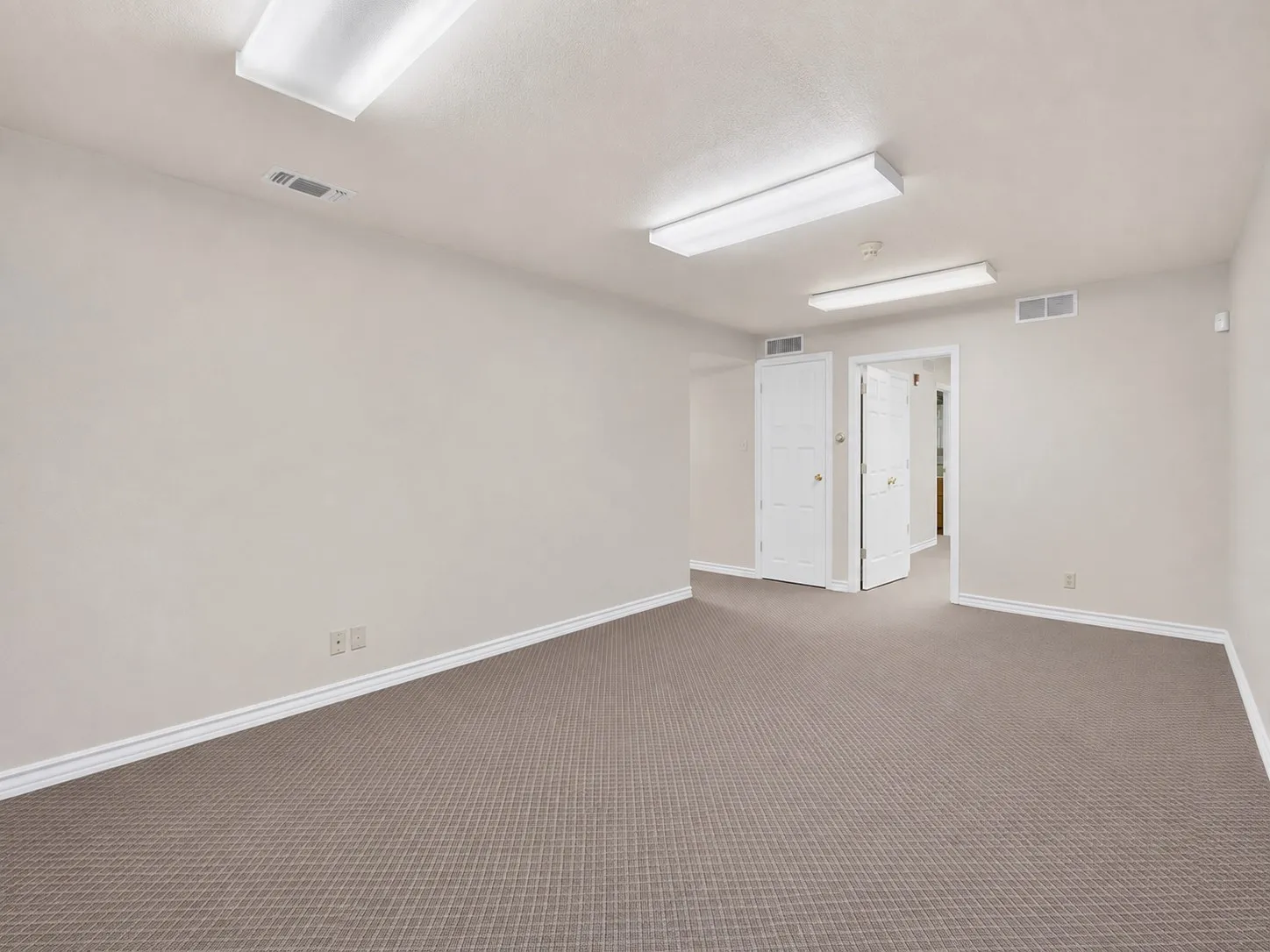 Neutral tone walls with white trim