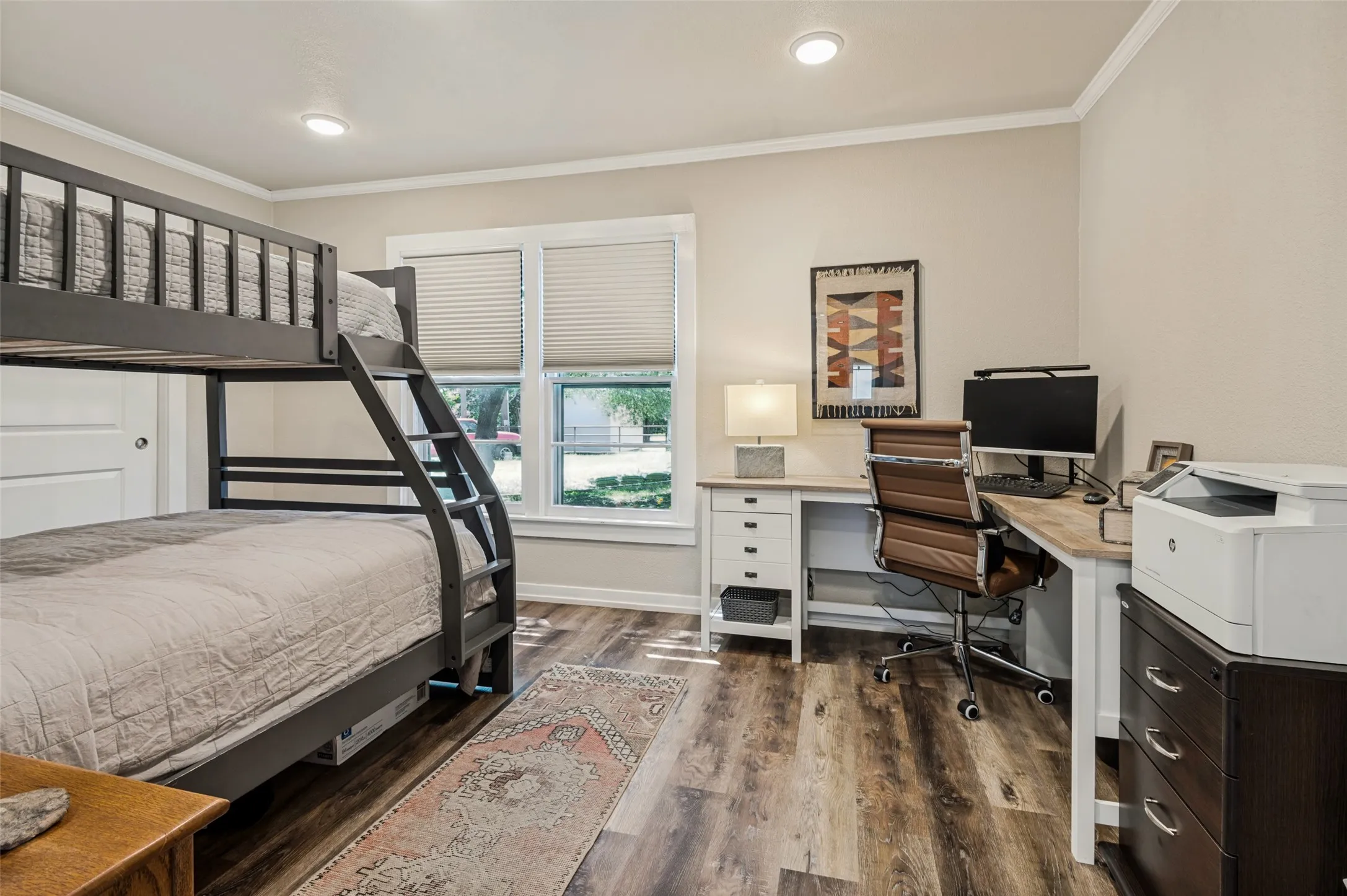 Secondary bedroom with bunk beads sleeps 3. Includes desk work area.