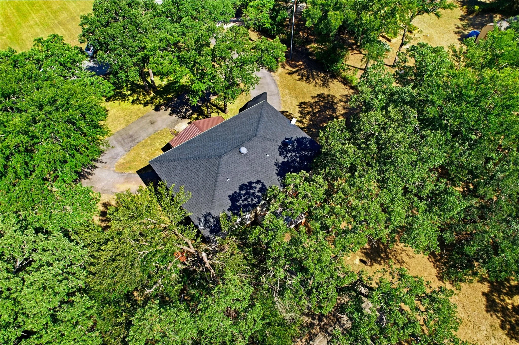 Asphalt shingle roof with a dark gray finish