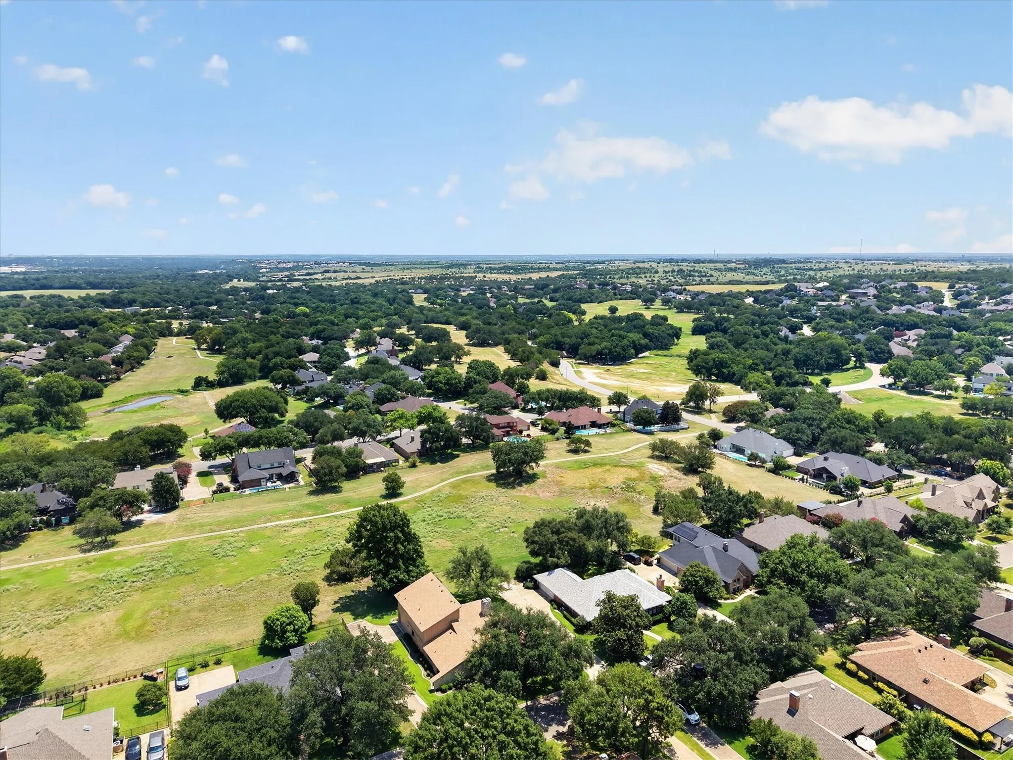 Backs to a greenbelt, to enjoy walking and jogging trails.  Bring your golf cart, you will enjoy riding around the greenbelt on the golf cart!
