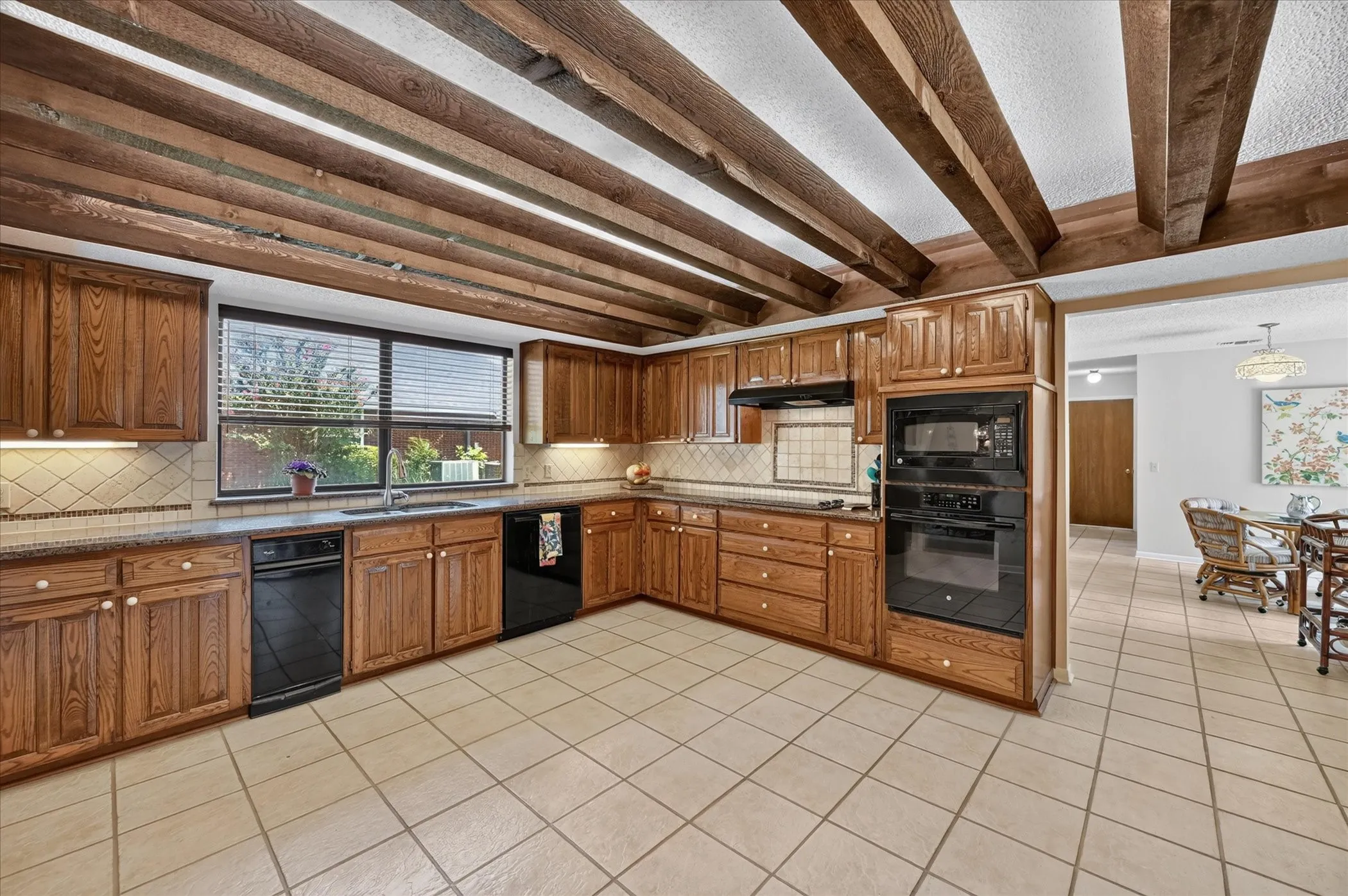 Kitchen and breakfast room! Tons of Cabinets!  Open kitchen, plenty of room to add a island!