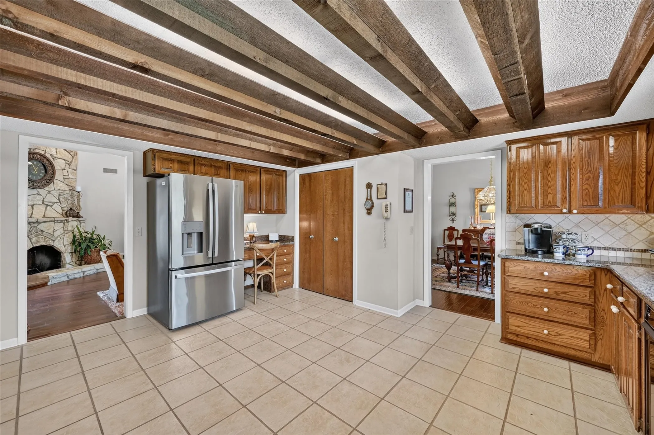 Another picture of this huge kitchen with built in desk & storage cabinets and large pantry!  Plenty of room for a island!