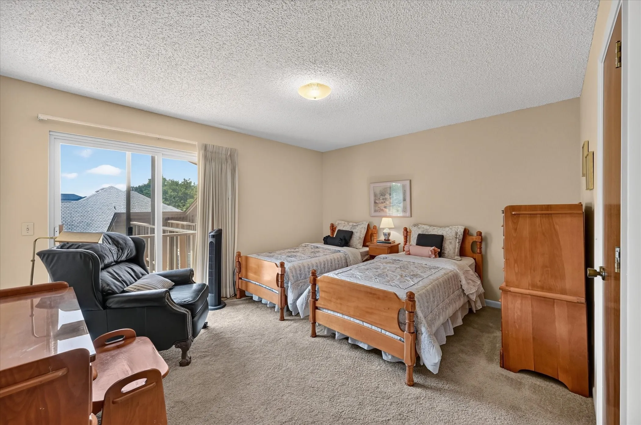 Bedroom 2, with walk in closet, shared bath with bedroom 3.