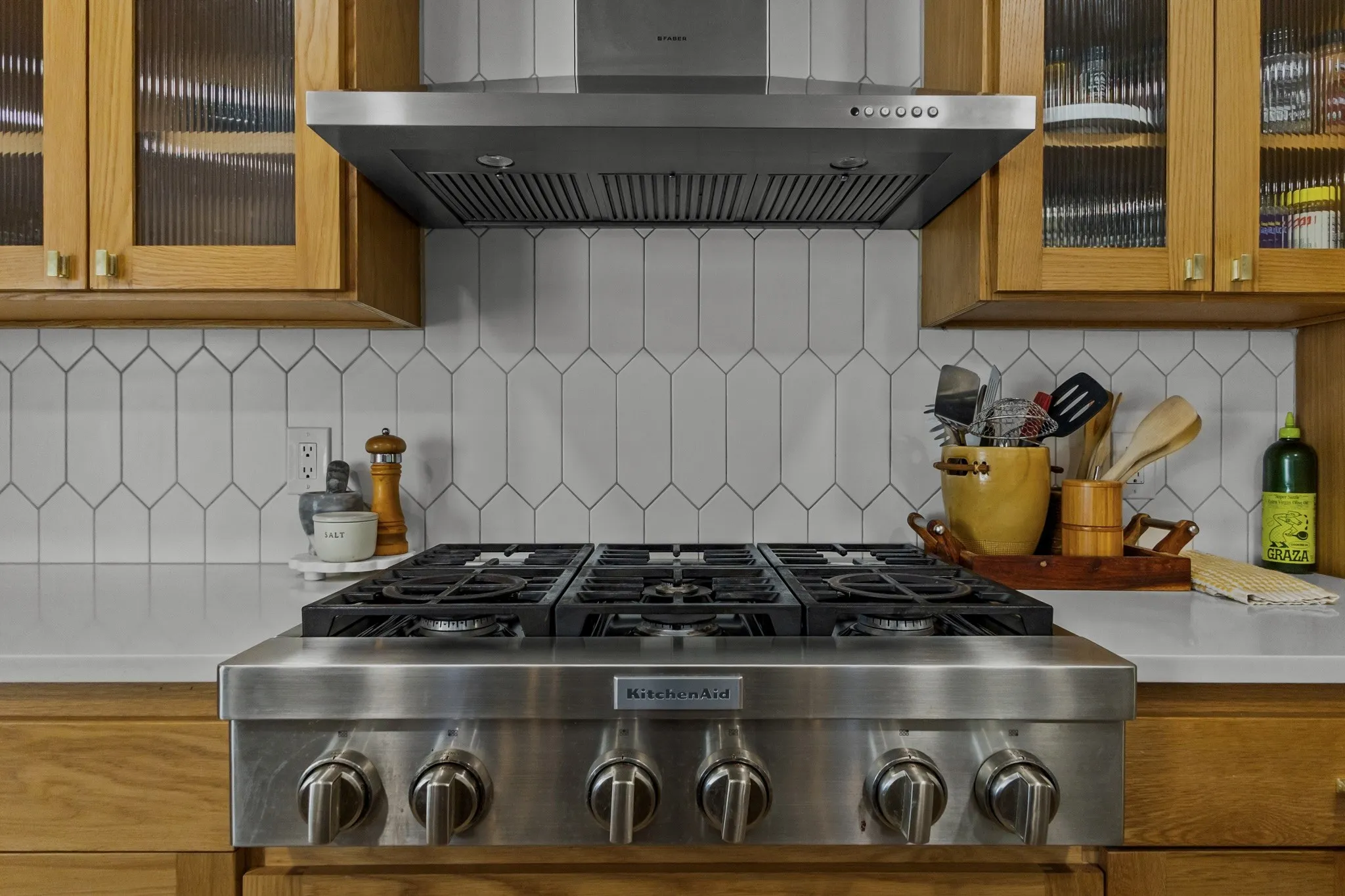 Kitchen-Aid gas six burner range.