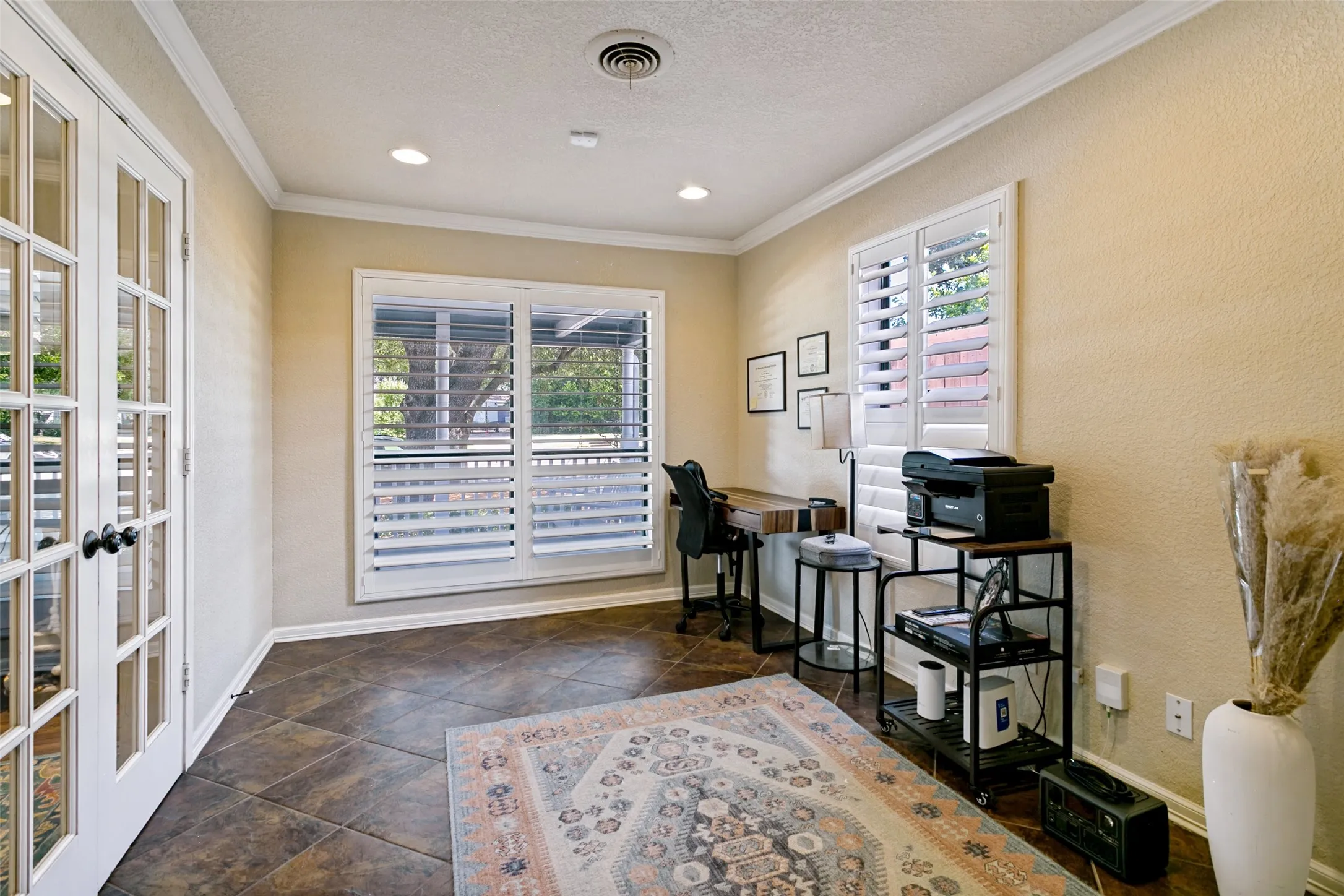 The third bedroom is currently being used as an office.