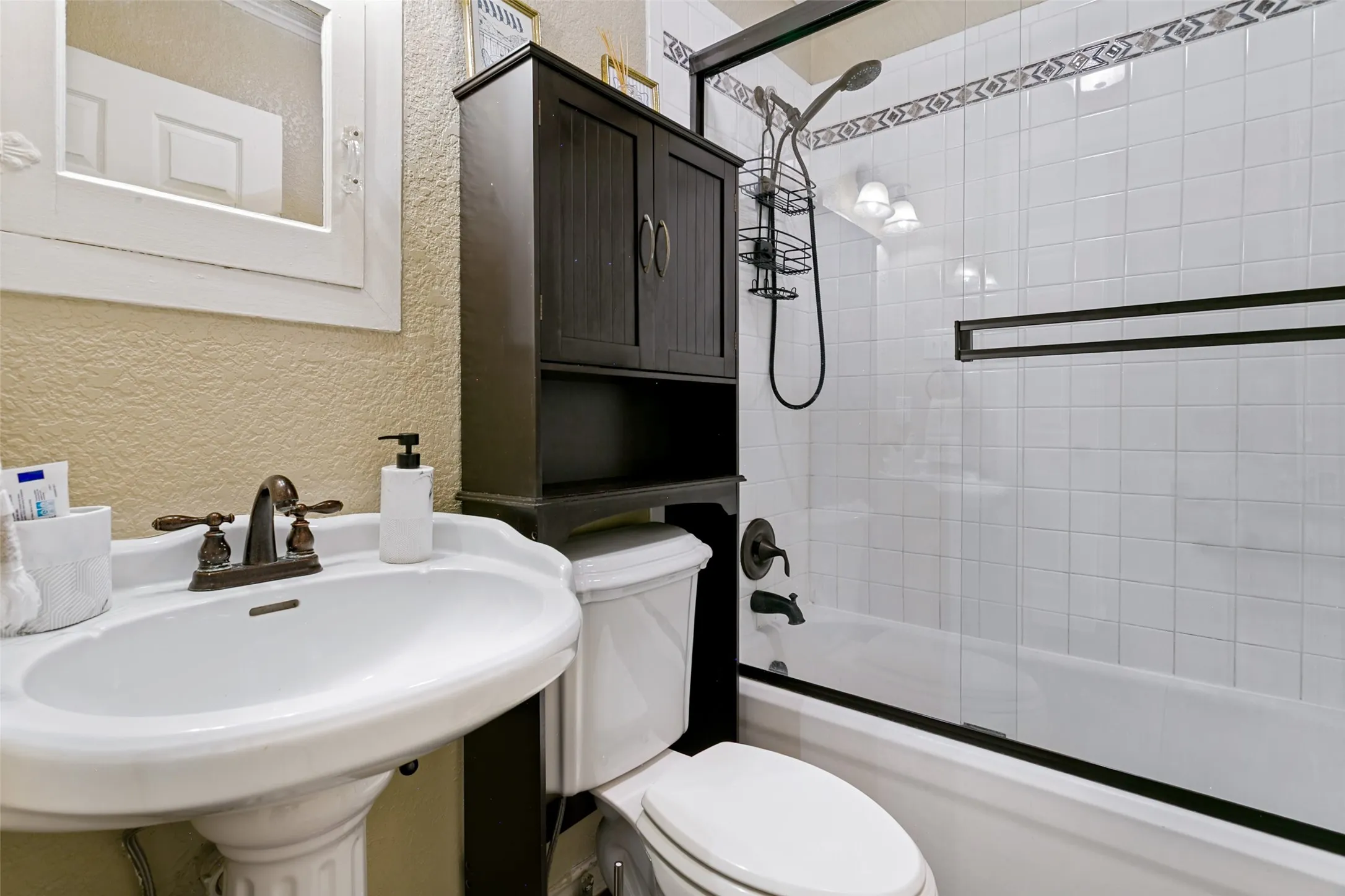 The guest bathroom is conveniently located.