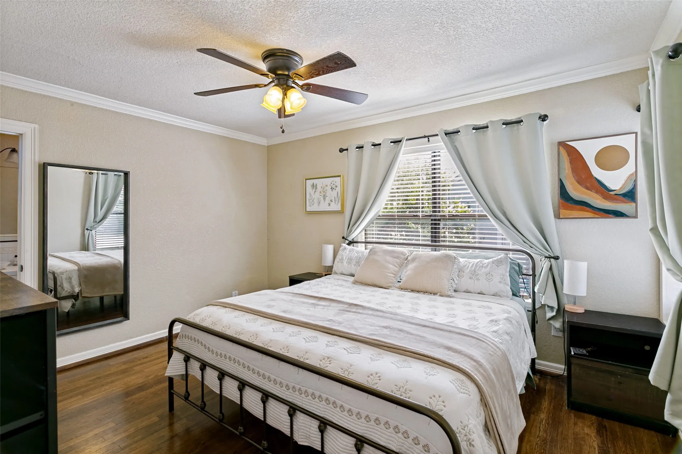 The primary bedroom is large enough for a king size bed.