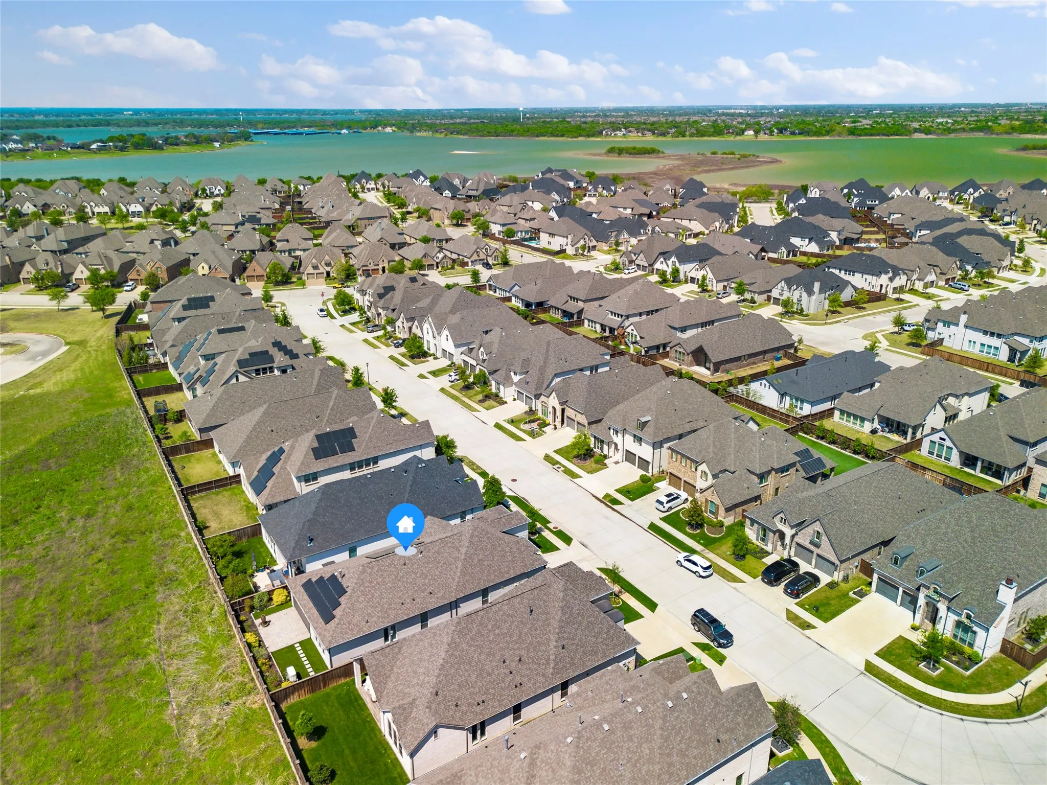 Aerial view of residential area with a nearby body of water