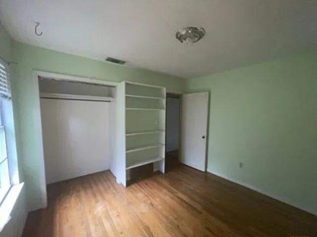Hardwood-style flooring throughout