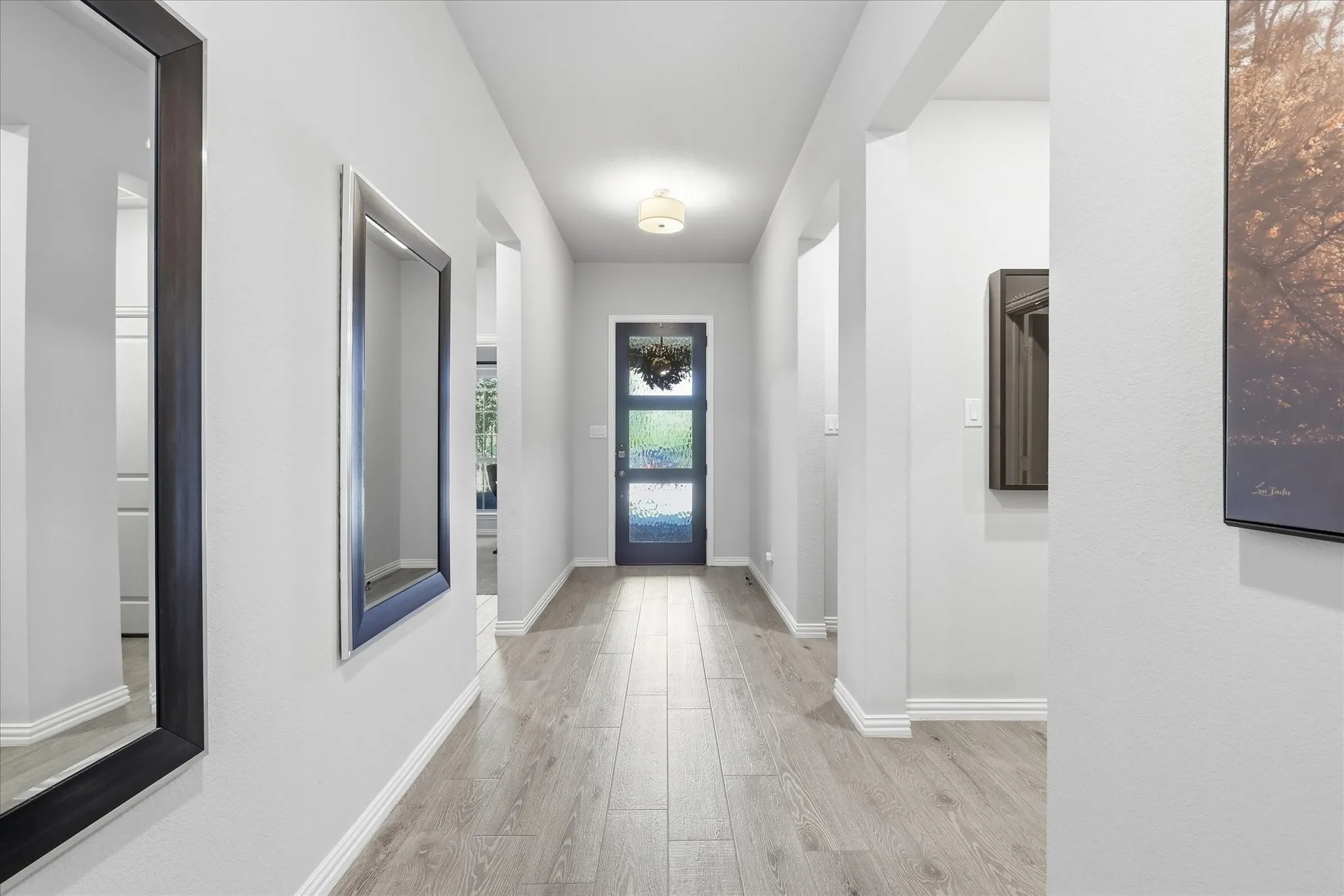 Large foyer and hallways with natural light and plenty of space