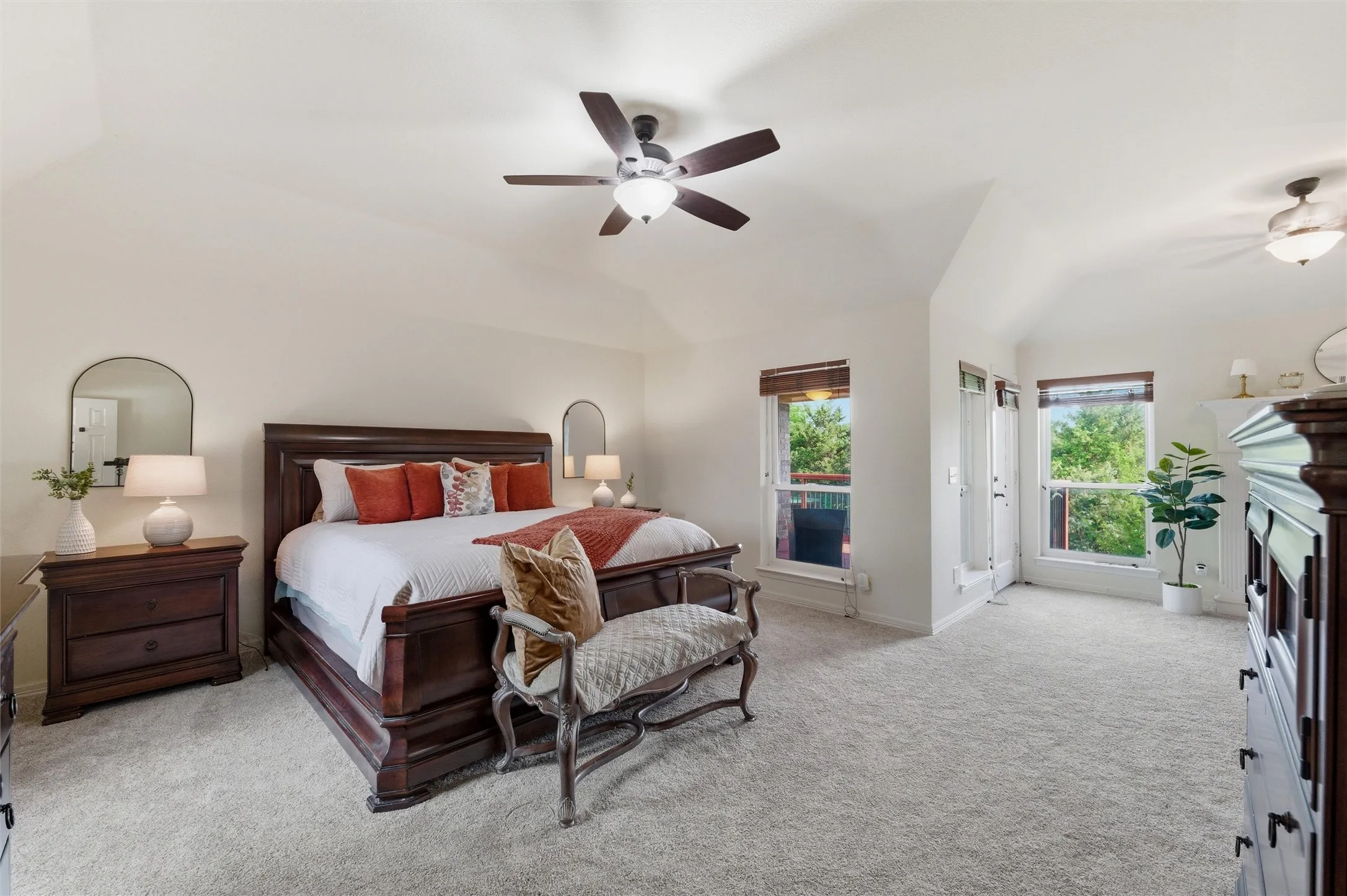 Primary Bedroom offers access to a balcony with a gorgeous view.