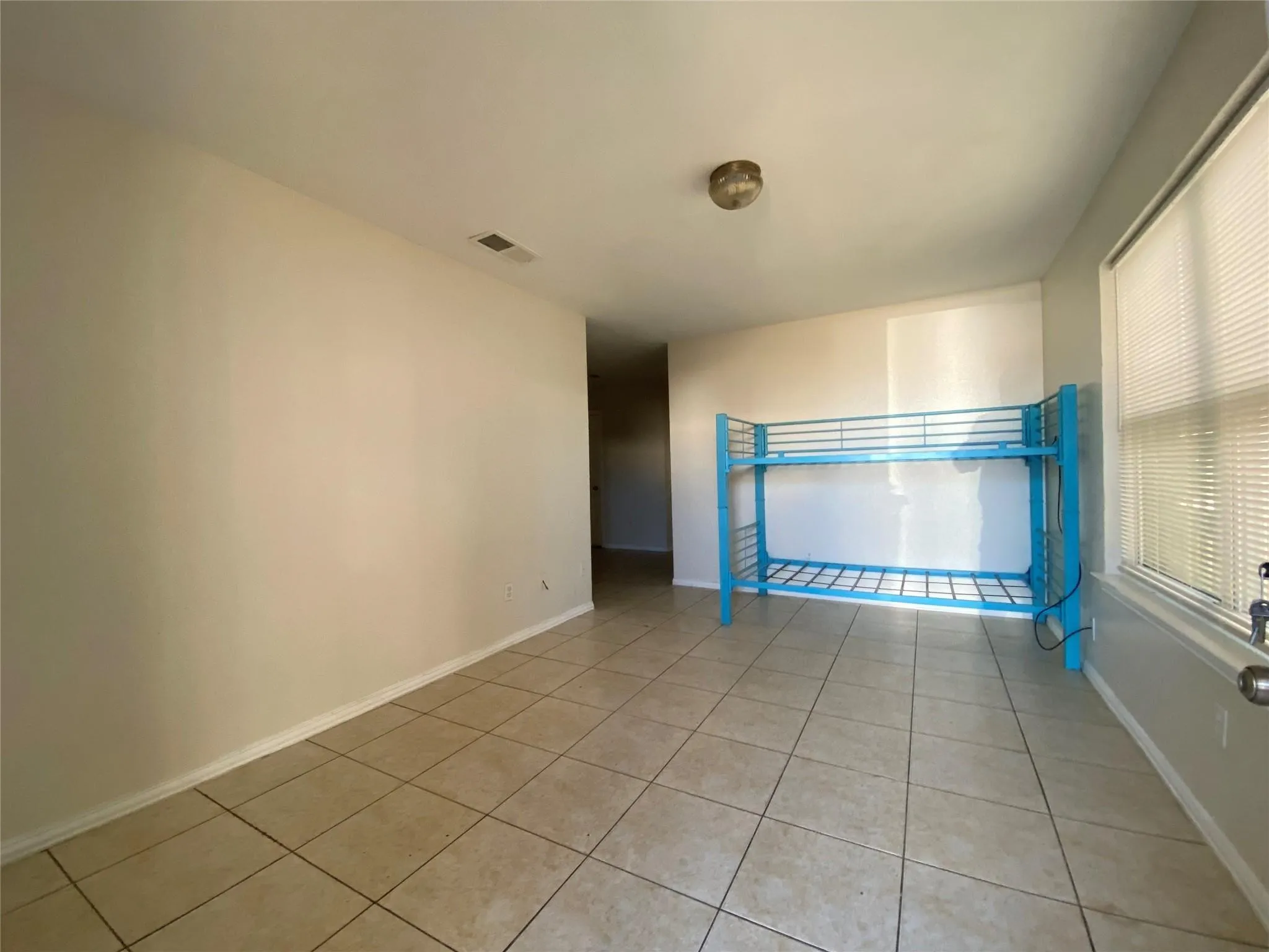 View of tiled empty room