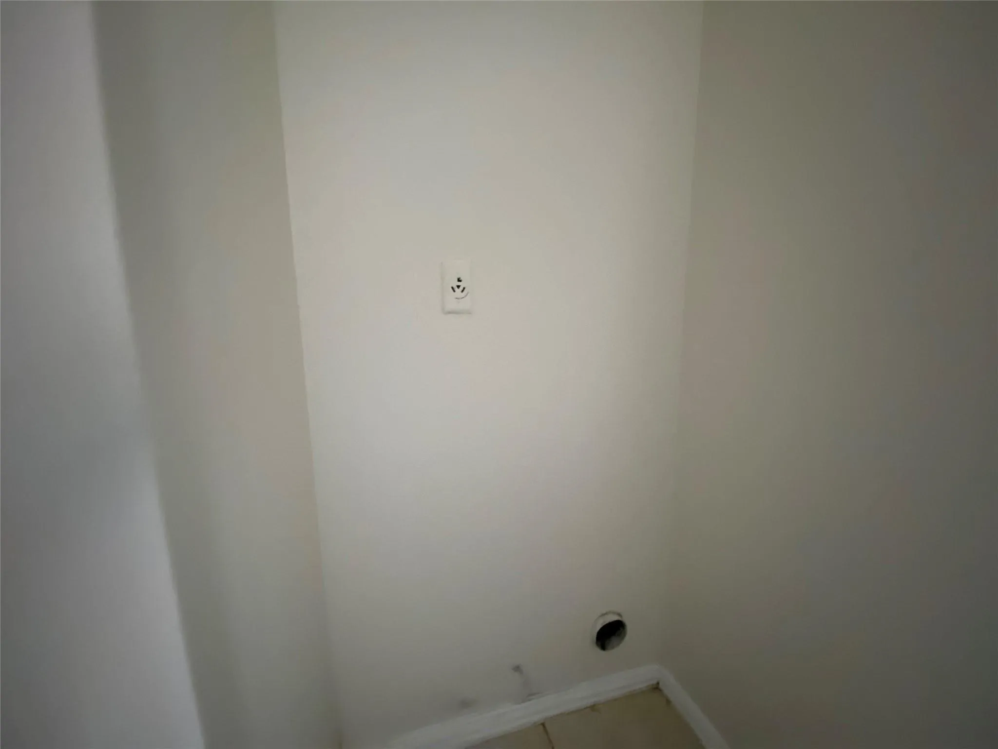 Washroom featuring tile patterned flooring and electric dryer hookup
