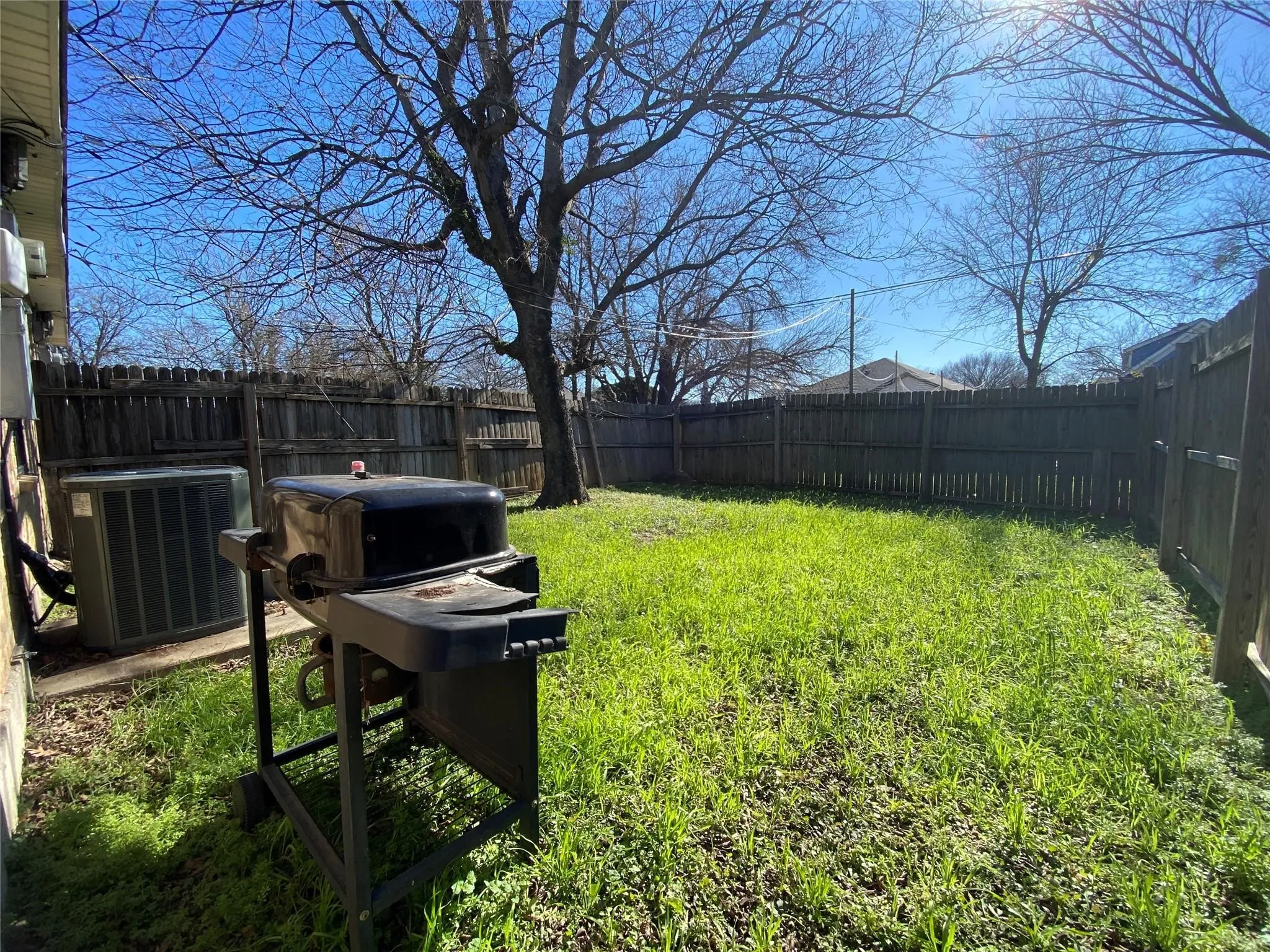 View of yard featuring central air condition unit