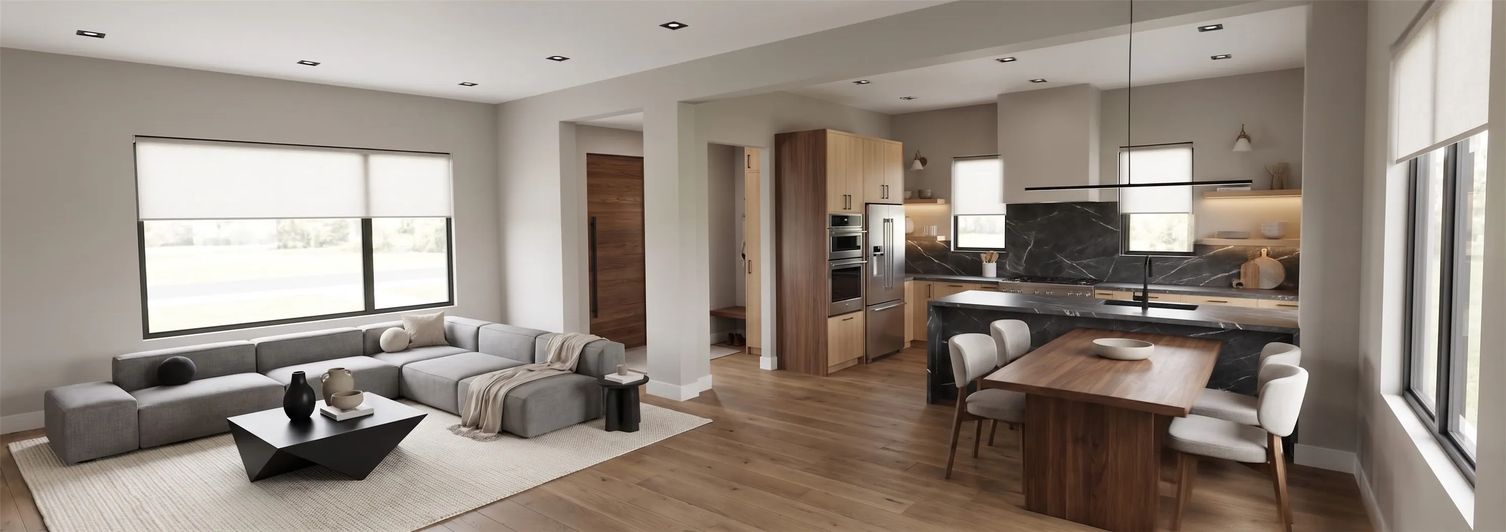 Open-concept living space featuring wood-finish flooring throughout