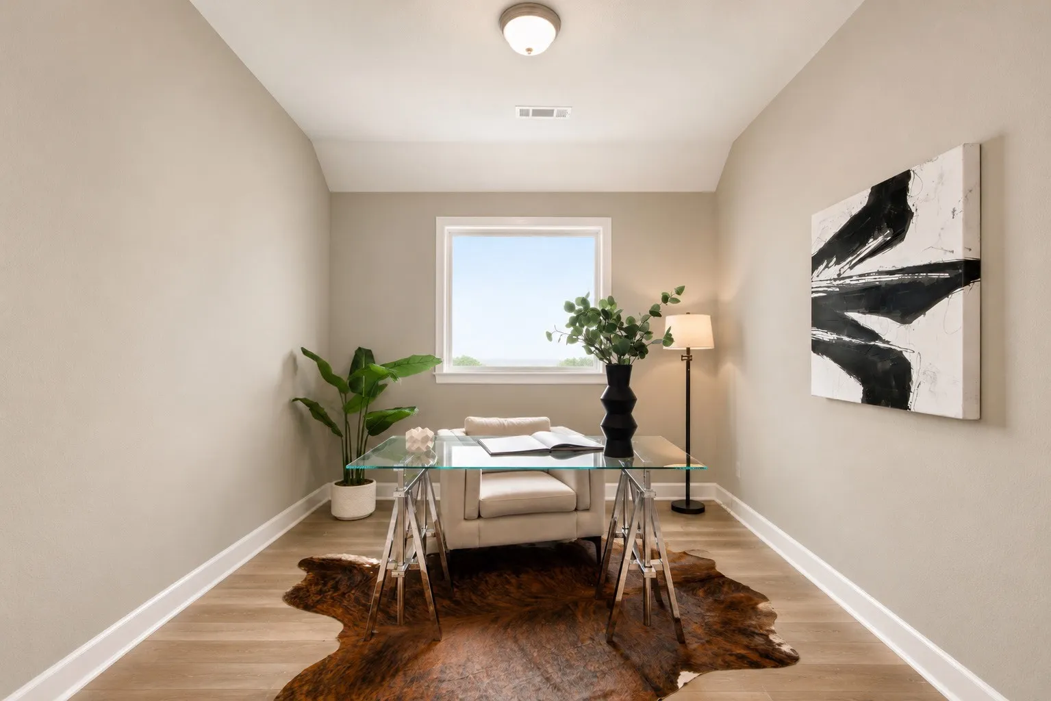 Dedicated room featuring wood-finish flooring, a single window, recessed lighting, and neutral wall tones