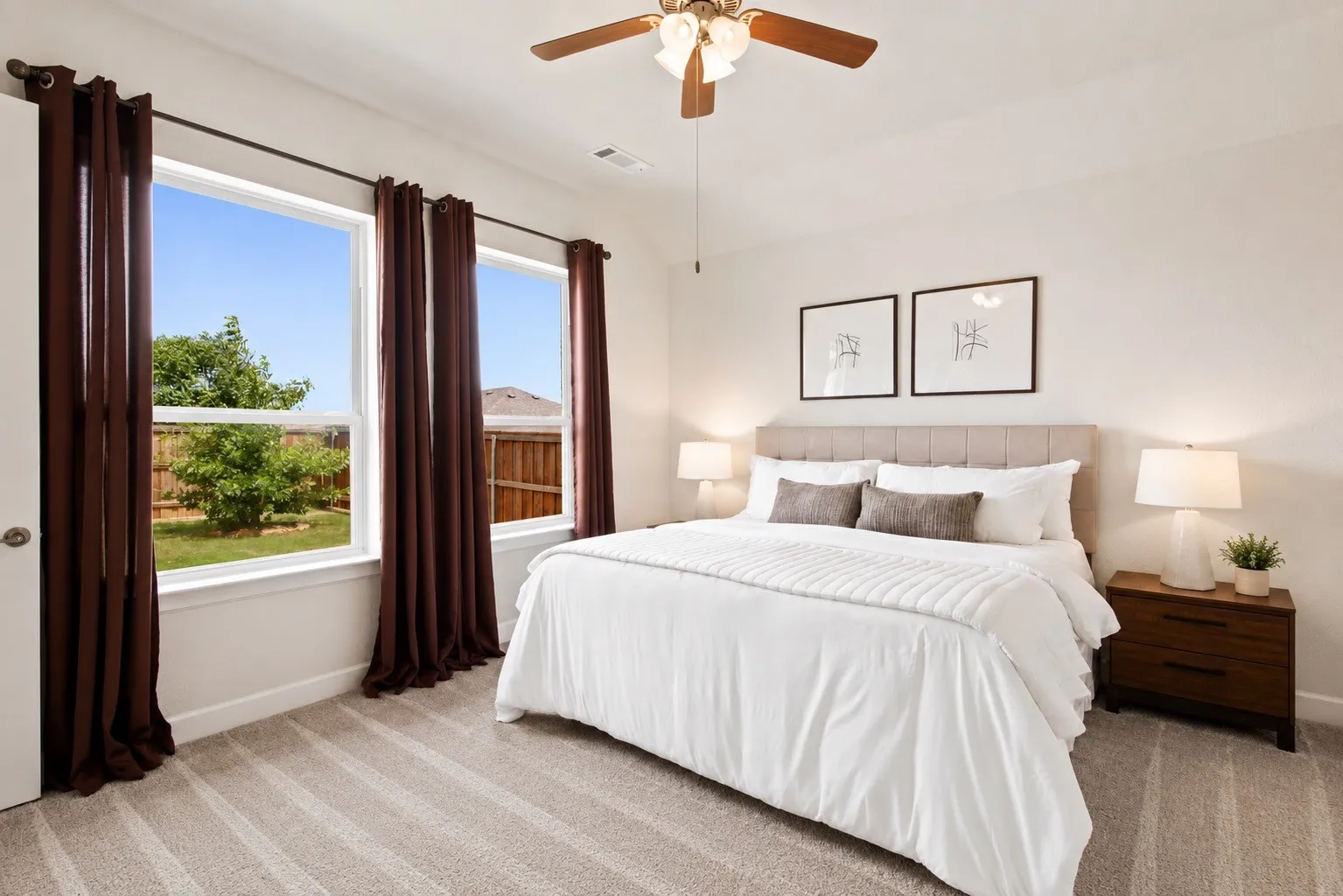 Neutral wall color with patterned carpet flooring