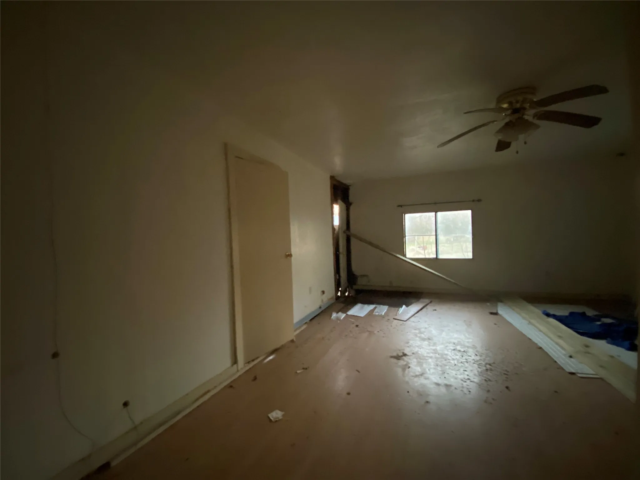 Spare room with ceiling fan