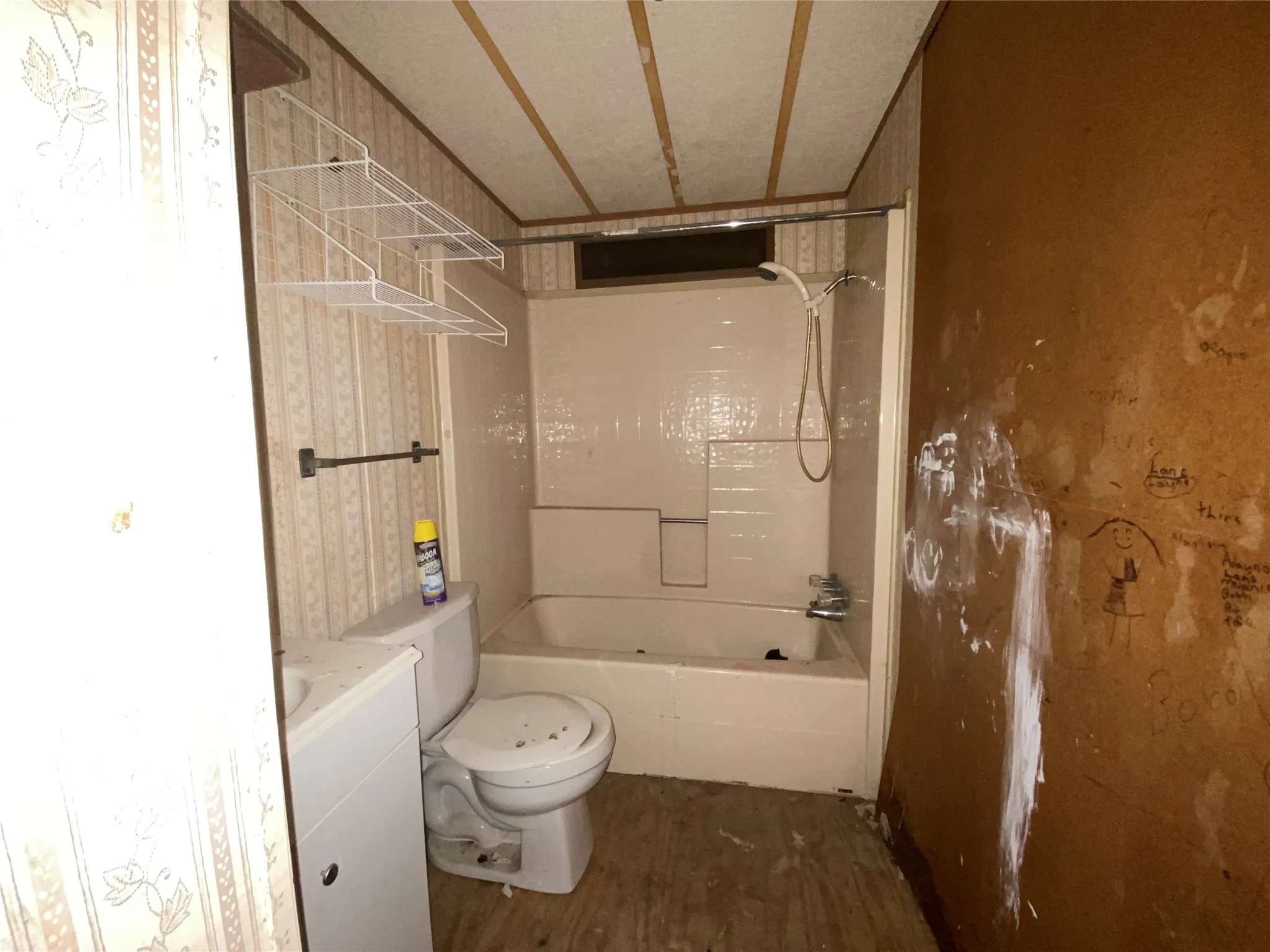 Full bathroom featuring vanity,  shower combination, hardwood / wood-style flooring, and toilet