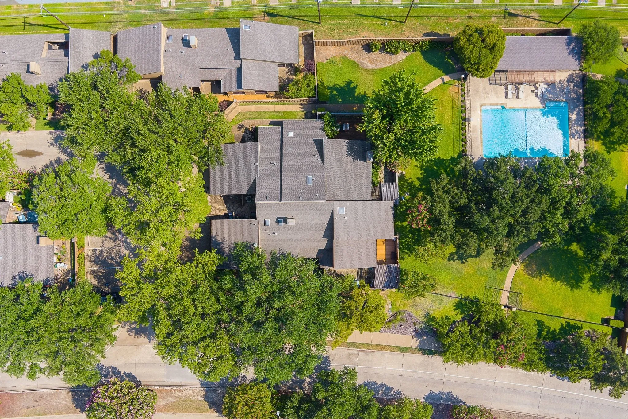 Aerial view — steps from community pool and green space.