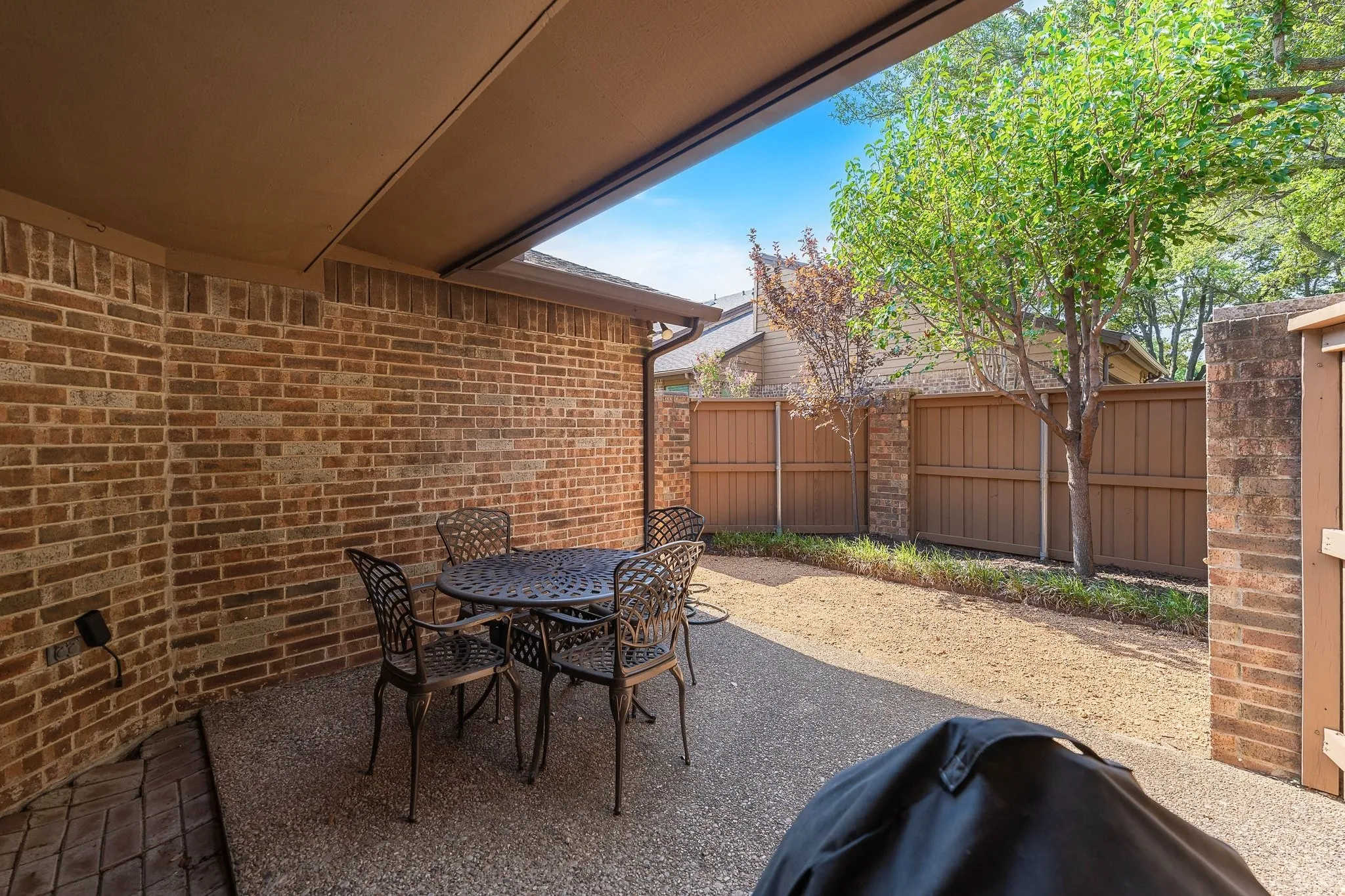 Fenced patio retreat, ideal for effortless outdoor entertaining