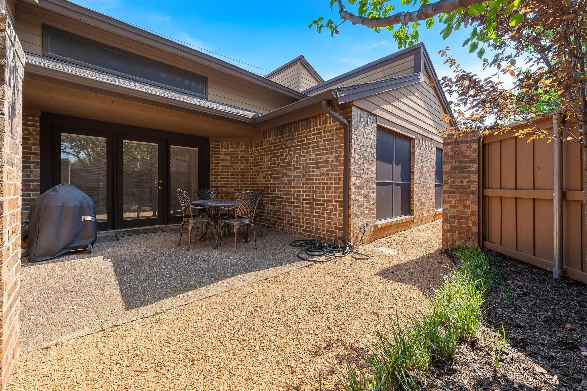 Fenced patio retreat, ideal for effortless outdoor entertaining
