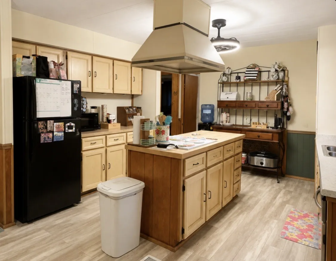 Central island with a wood-finish countertop