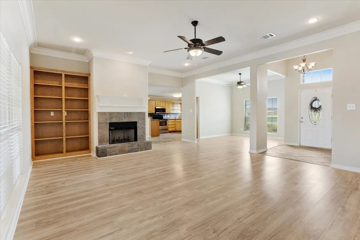 Beautiful wood burning fireplace and built-in bookcase