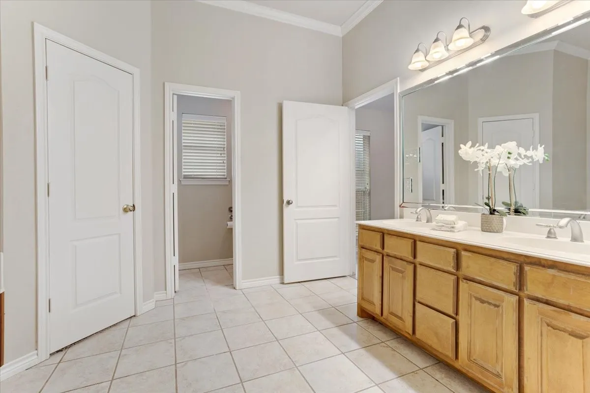 The other walk in closet and the water closet.