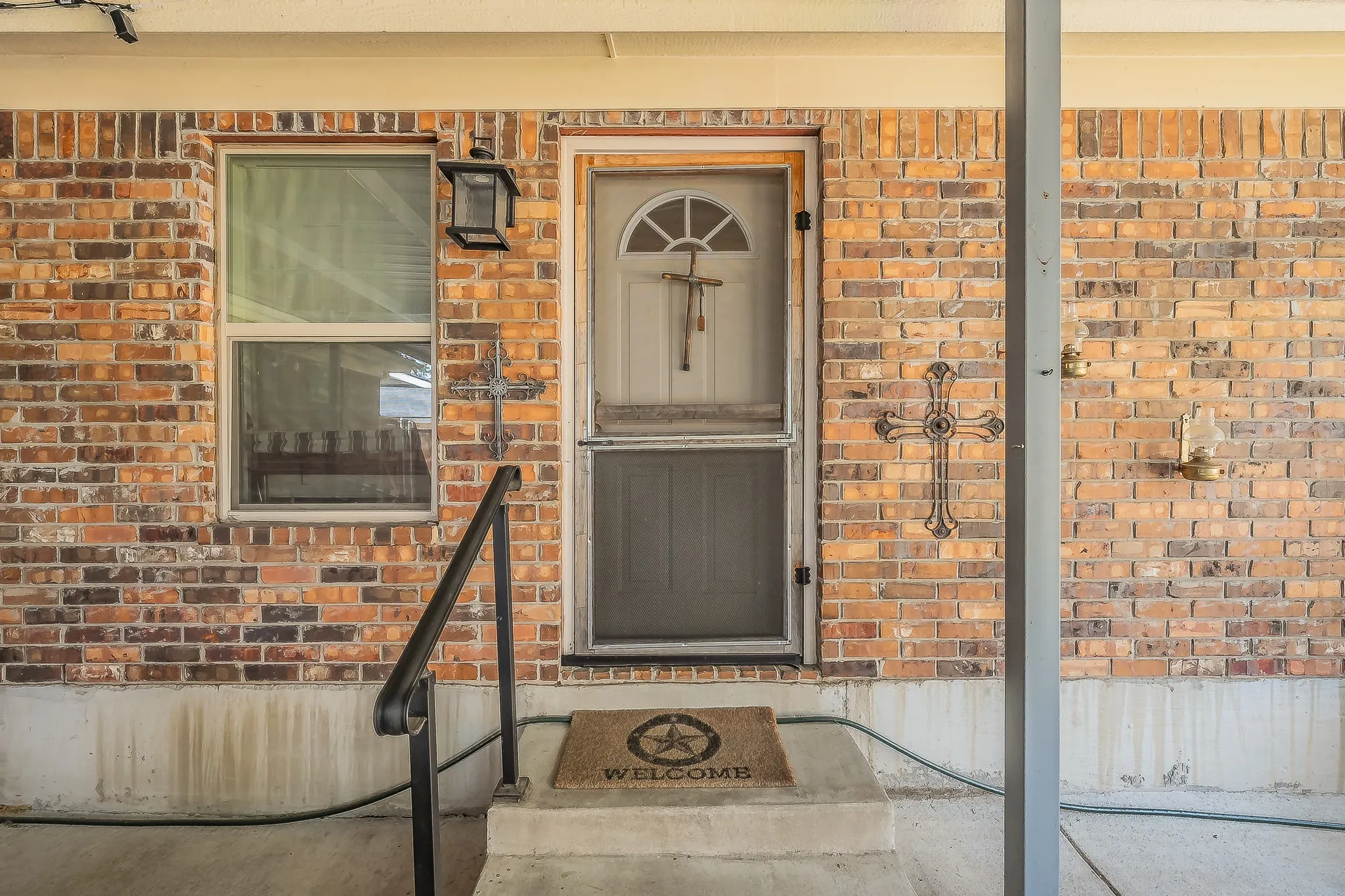 Entrance into attached Mother In Law Suite. Under back covered porch.  This is where the 2nd living, 3rd batheroom and 4th bedroom is located,