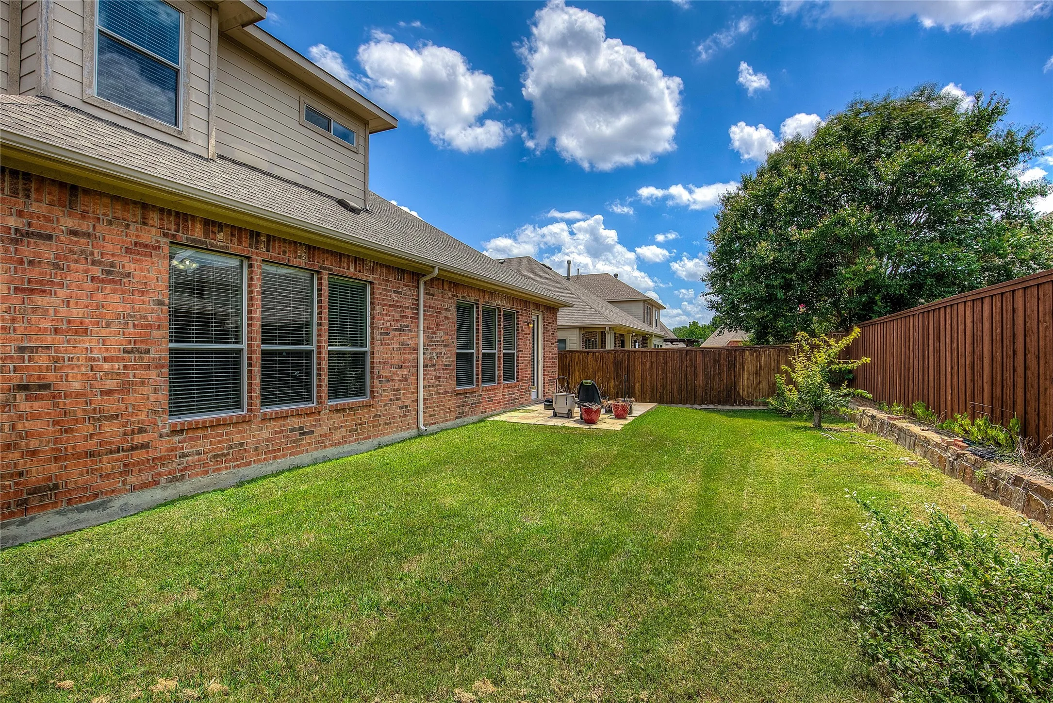 View of yard featuring a patio area