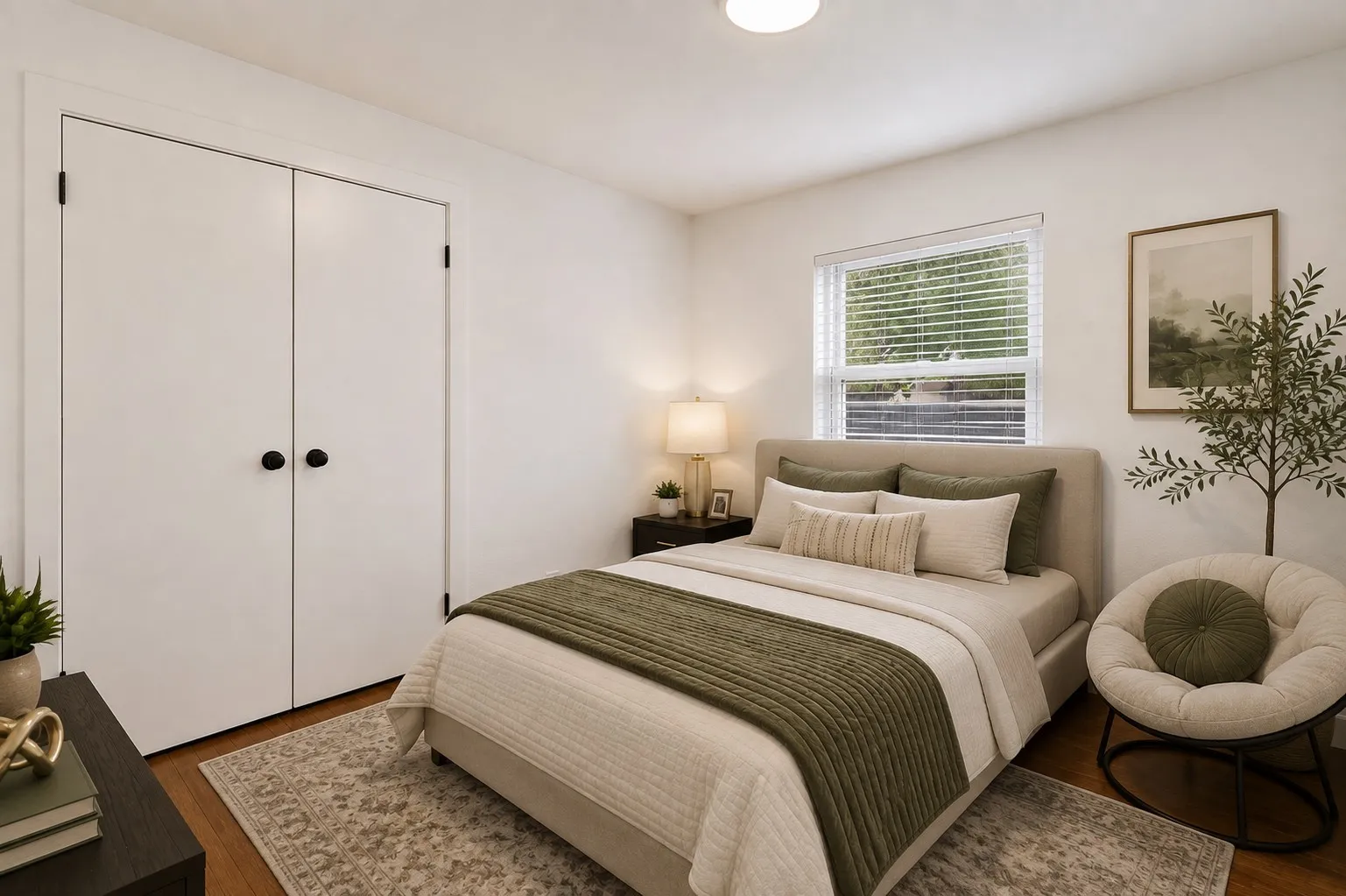 Designed with comfort and timeless style in mind, this beautifully appointed bedroom offers a peaceful retreat filled with warmth and natural light. The spacious closet provides generous storage