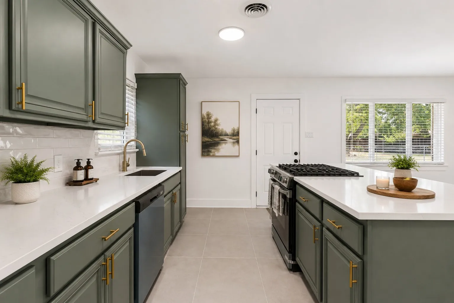 Gourmet kitchen, sophisticated gold hardware, quartz countertops, undermount sink,  brushed-gold faucet, modern subway title backsplash