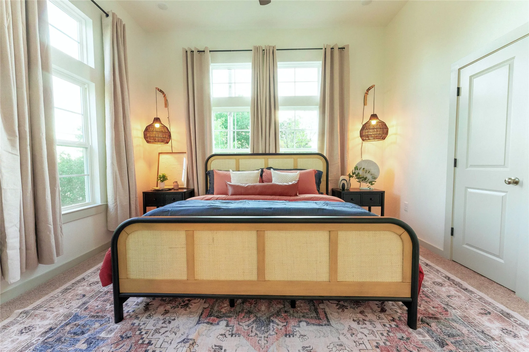 Bedroom featuring ample natural light from multiple windows, neutral wall tones, and recessed lighting