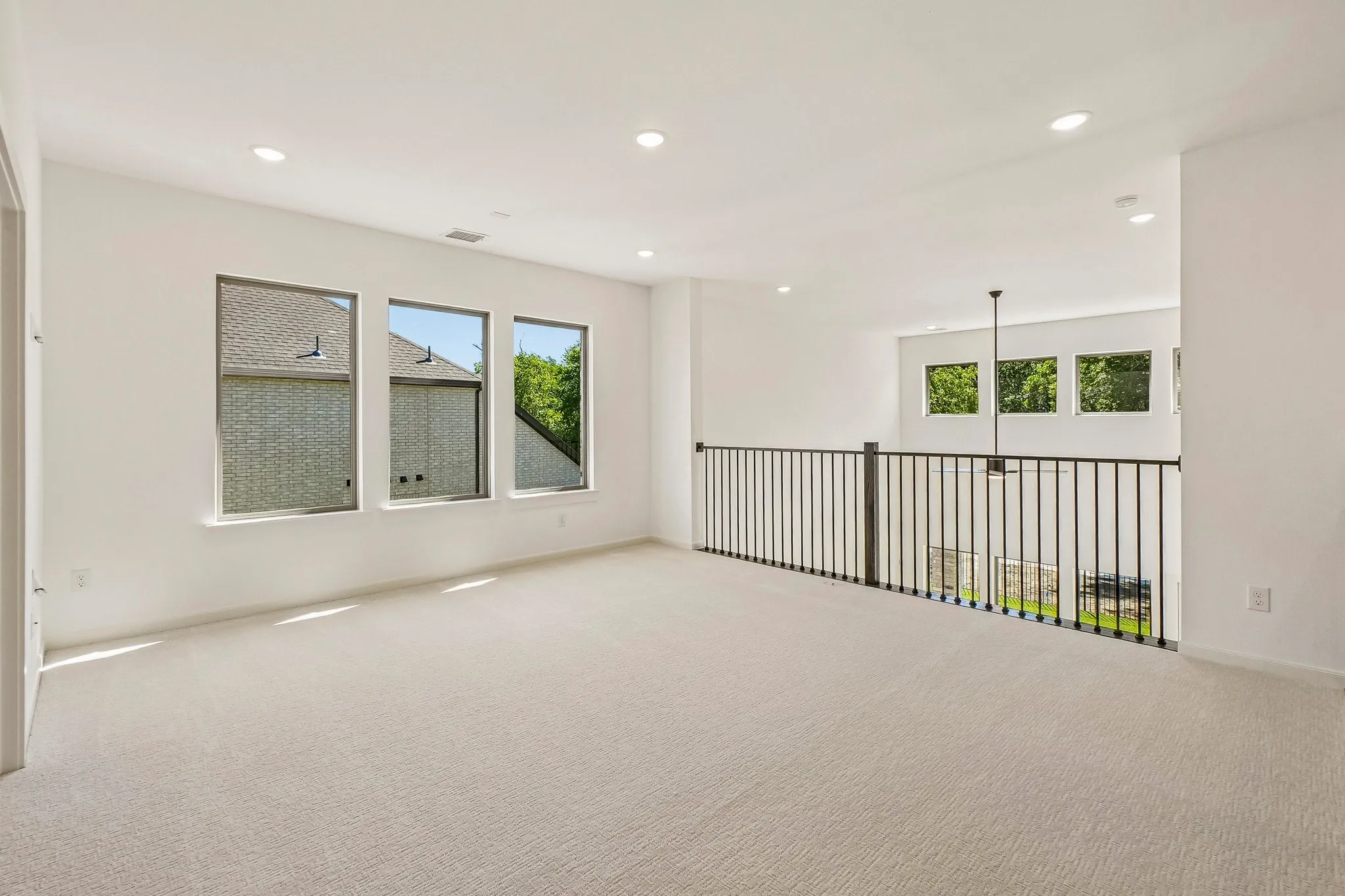 The entire family will enjoy entertaining in this light filled game room!