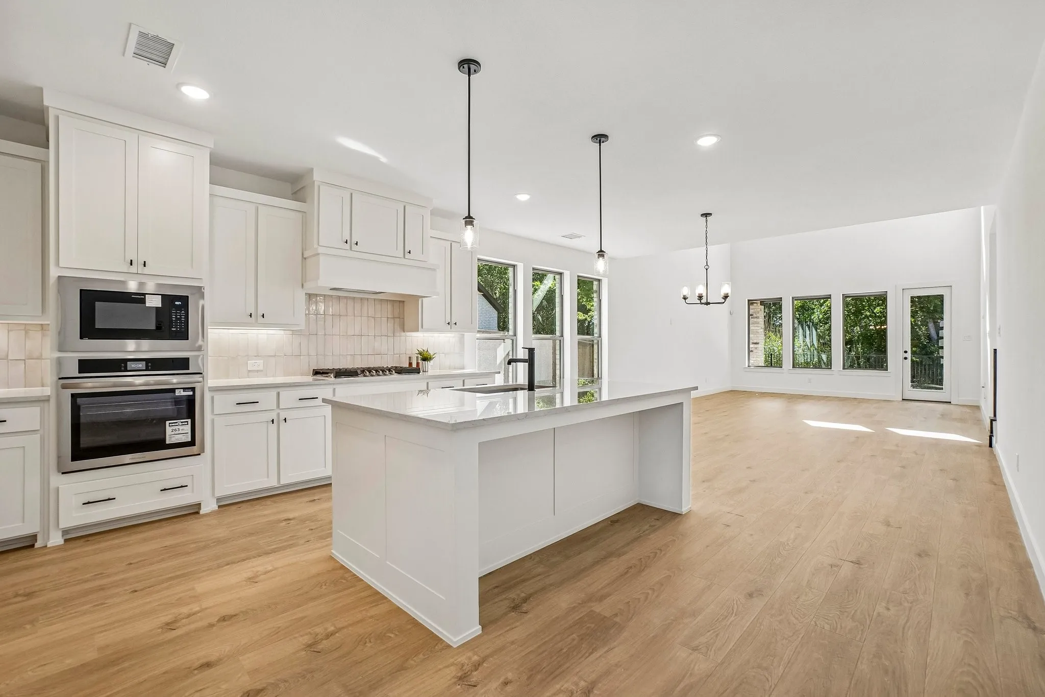 All the chefs in the family will enjoy the storage and prep space offered in this over the top kitchen!