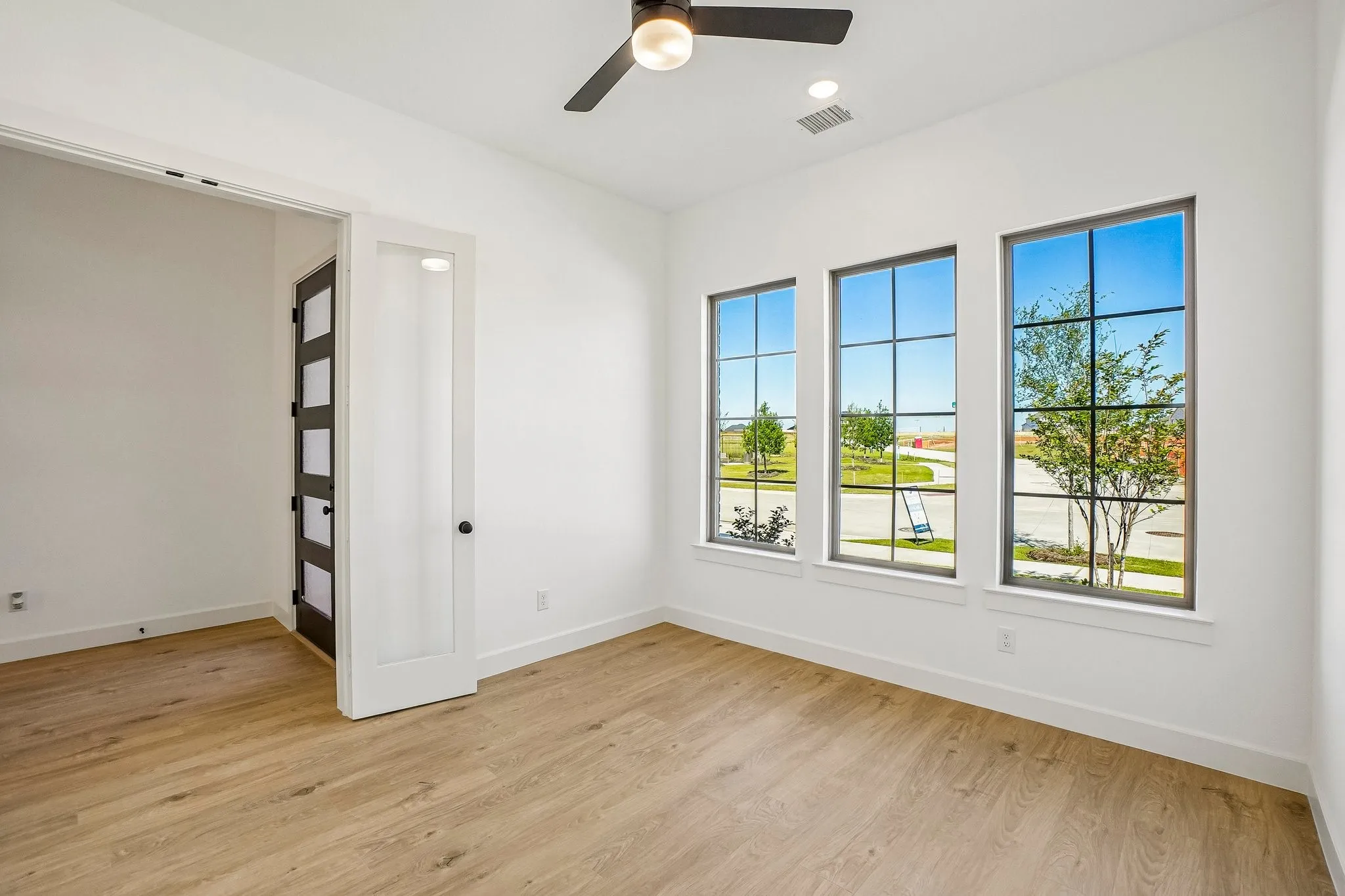 The professional needing to work from home will appreciate this light, bright and private home office.