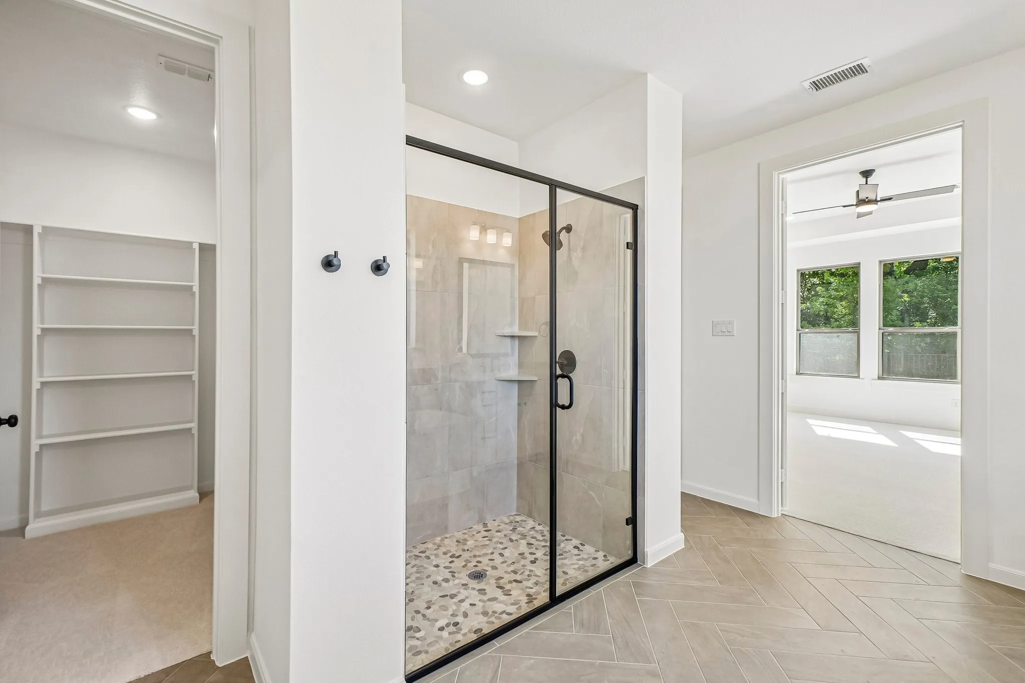 Featuring a spacious walk in shower plus his and her closets, this dream owner's bath is one for the ages!