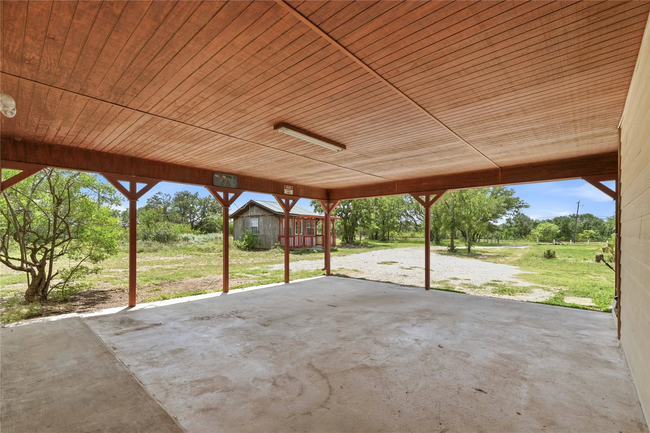 Carport looking toward the Insulated workshop or hobby building